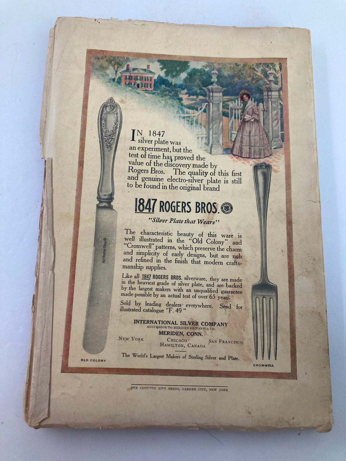 Back cover of VTG The World's Work Magazine June 1913, displaying an advertisement for 1847 Rogers Bros. silver plate, emphasizing the era's design and craftsmanship.