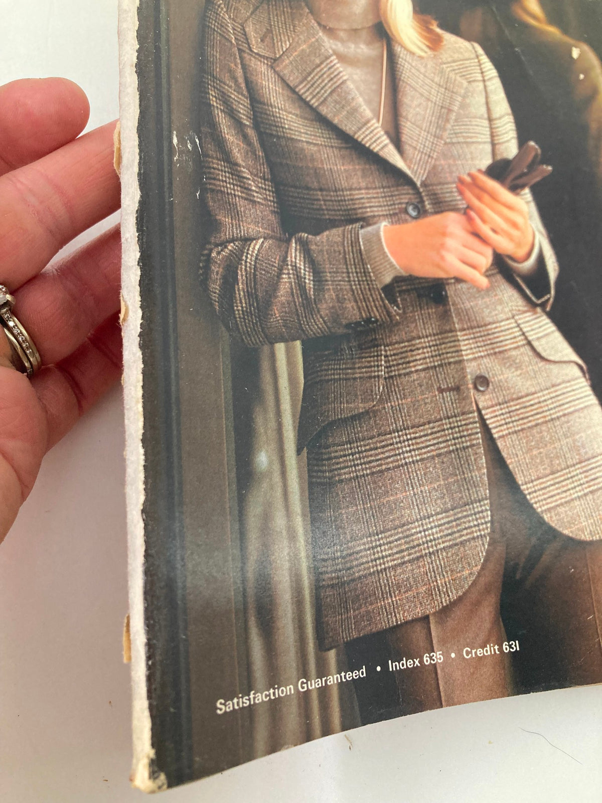 Close-up of the 1977 Fall & Winter Montgomery Ward & Co. Catalog cover, featuring a stylish plaid blazer worn by a woman, showcasing the catalog's vintage fashion appeal.