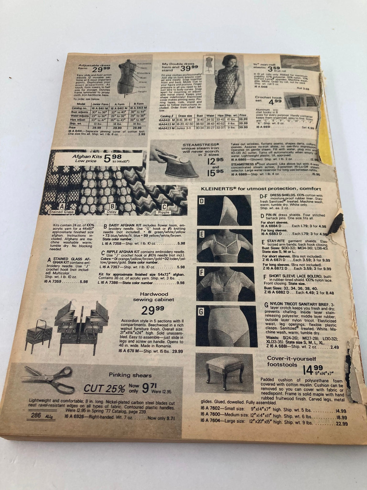 The back cover of the 1977 Fall & Winter Montgomery Ward & Co. Catalog, displaying various household items and sewing tools available during the late 1970s.