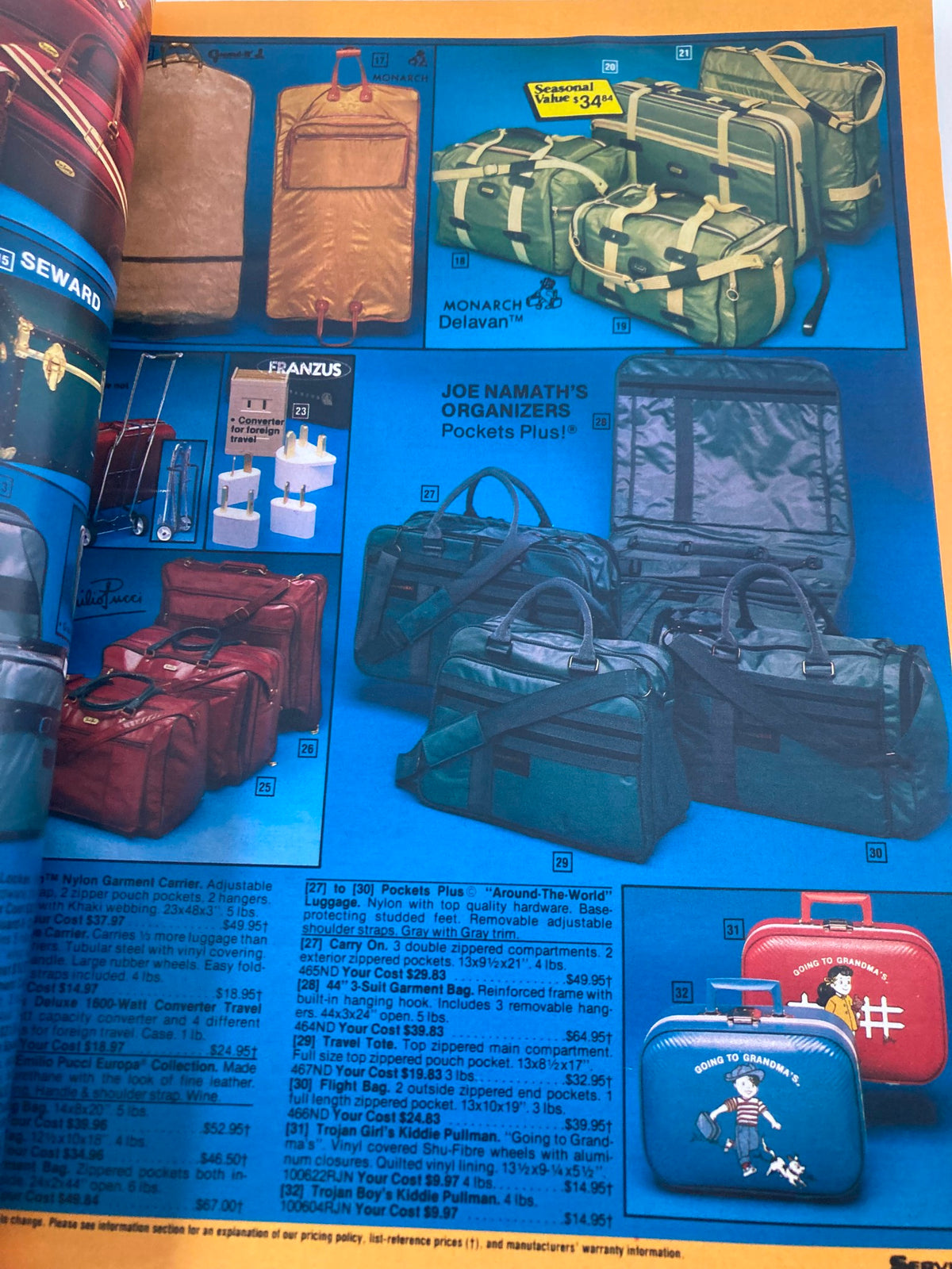 Luggage and travel accessories from the 1984 Service Merchandise Spring and Summer Catalog, highlighting various styles of bags and organizational products against a colorful blue background.