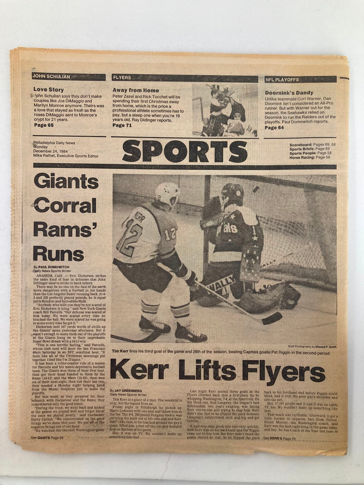 Philadelphia Daily News Tabloid December 24 1984 featuring sports section with headline 'Giants Corral Rams' Runs' and details on Flyers' game. This vintage newspaper is in good condition and comes with a plastic protective covering.
