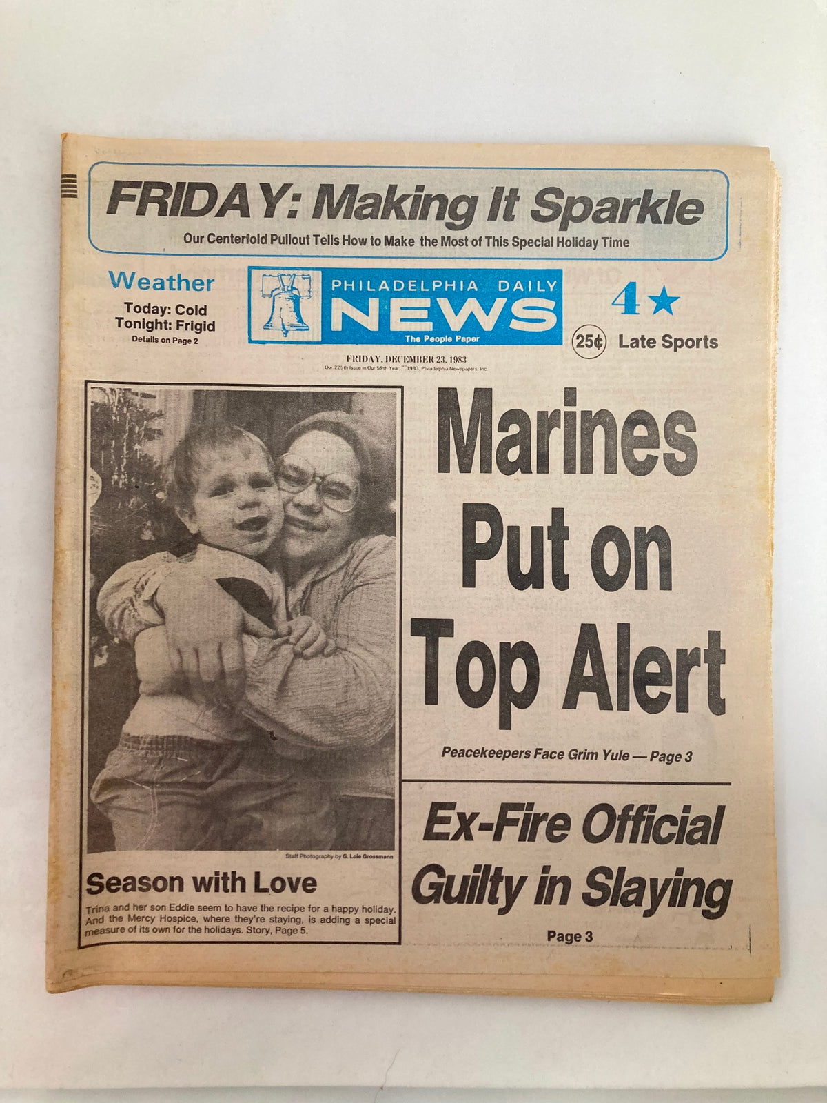 Philadelphia Daily News Tabloid December 23, 1983 - Trina & Eddie Season of Love cover featuring an emotional family moment and the headline 'Season with Love' alongside news articles and a vintage design.