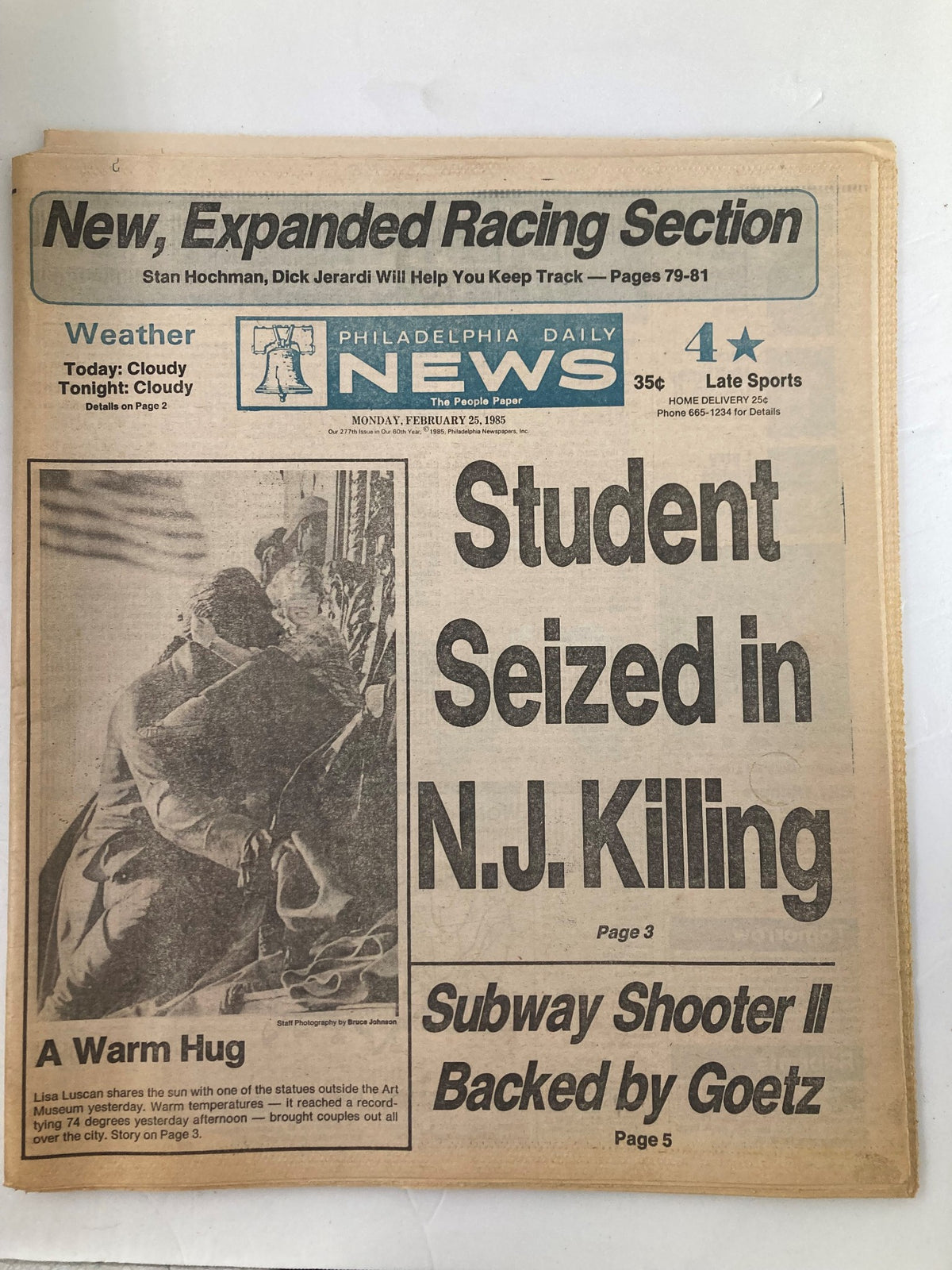 Philadelphia Daily News Tabloid from February 25, 1985 featuring Lisa Luscan in A Warm Hug, capturing a moment of warmth and community in the mid-1980s, with headlines and visual elements characteristic of the era.