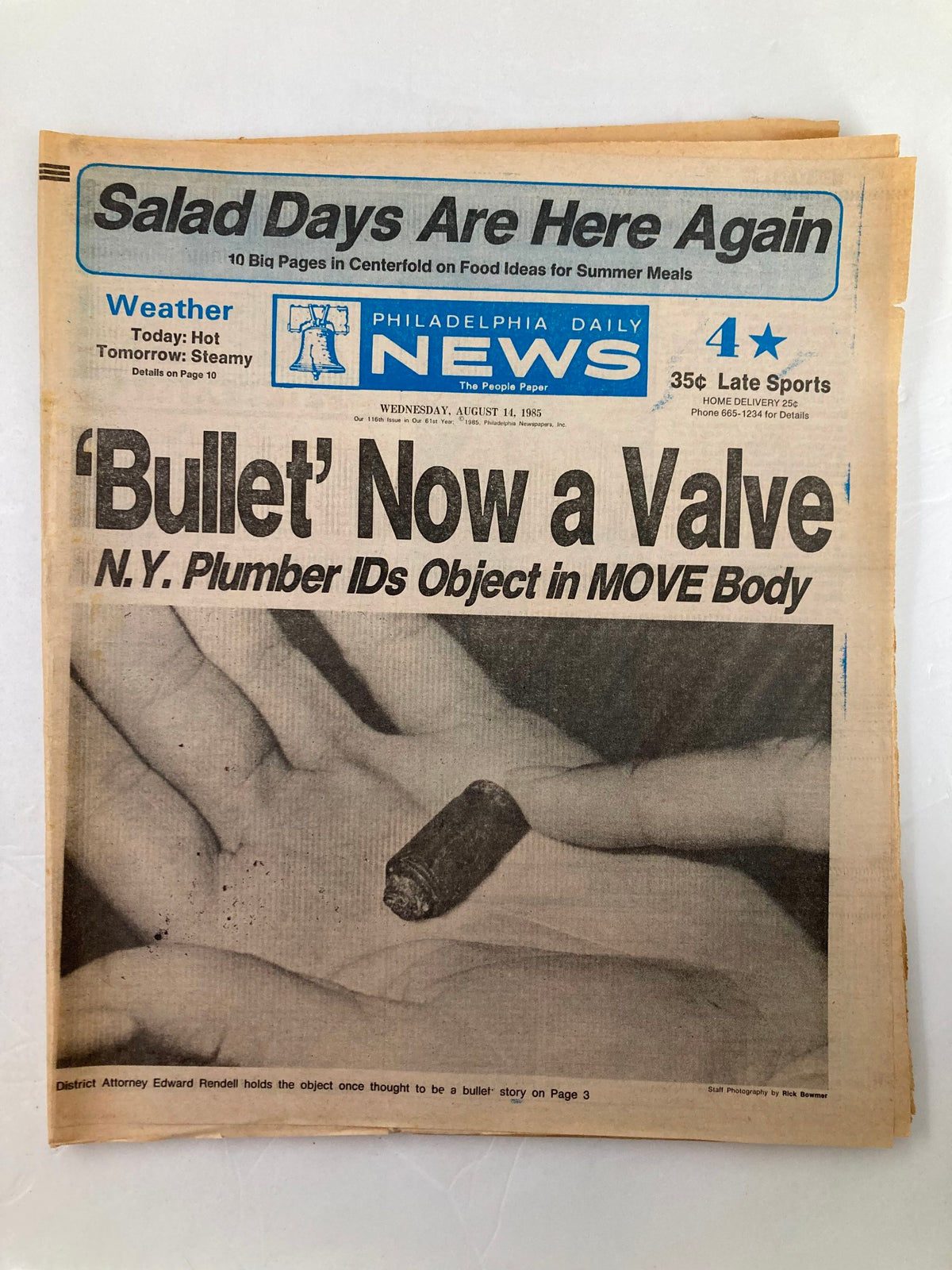 Philadelphia Daily News Tabloid August 14, 1985 featuring District Attorney Edward Rendell holding an object previously thought to be a bullet, accompanied by news headlines.