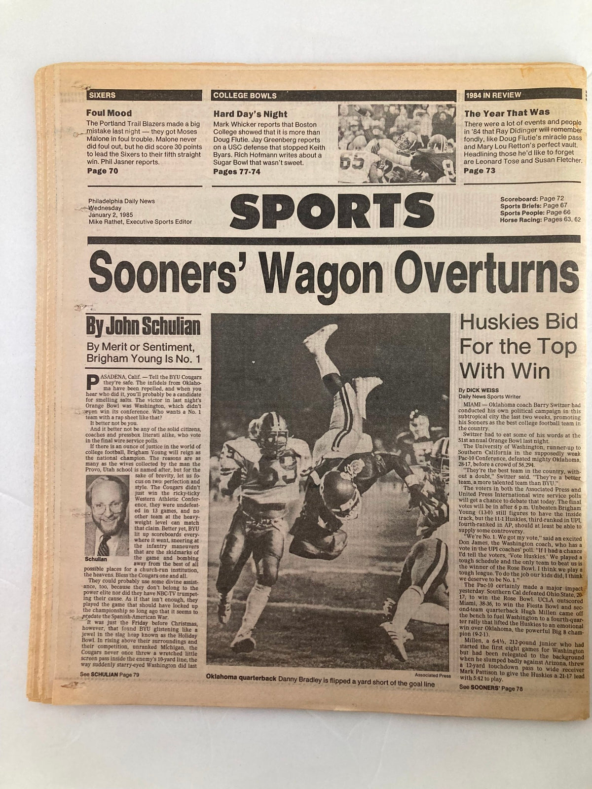 Philadelphia Daily News January 2 1985 sports section showcasing the headline 'Sooners’ Wagon Overturns,' featuring Oklahoma Quarterbacks in action during the college football season.