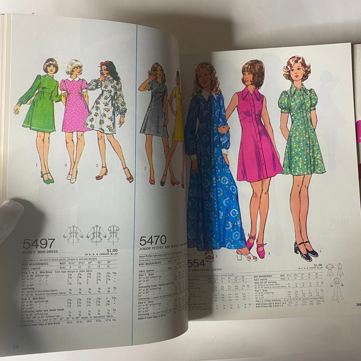 1973 July Simplicity Catalog displaying vintage sewing patterns for various misses' dresses, featuring multiple styles including mini-dresses.