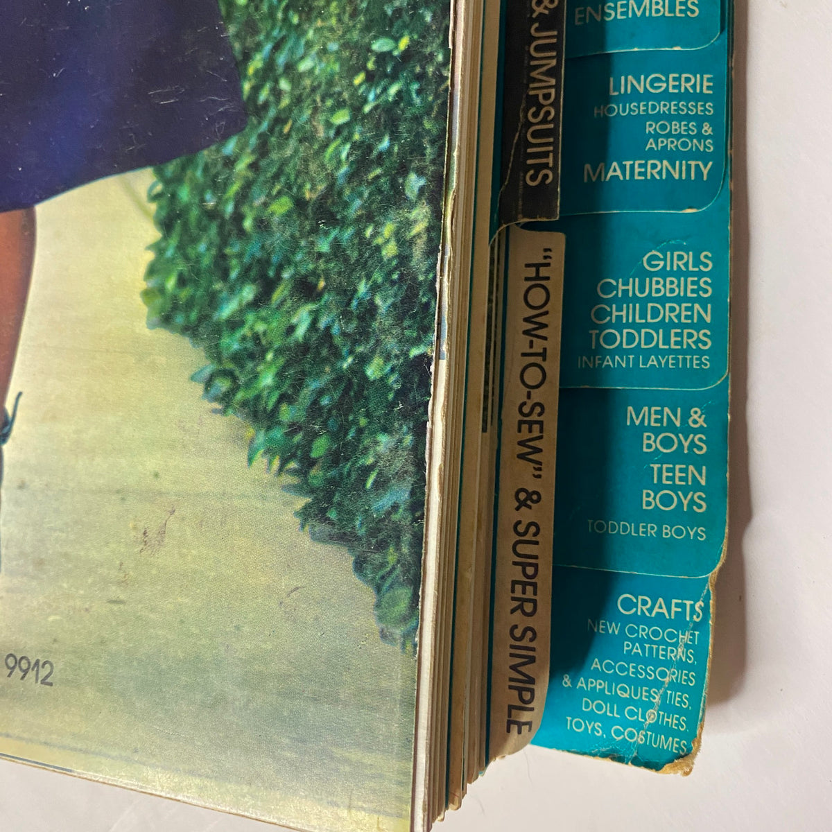 1972 April Simplicity Spring Catalog sewing pattern's detail including stylish young adults, emphasizing the categories for garments like dresses and utility patterns.