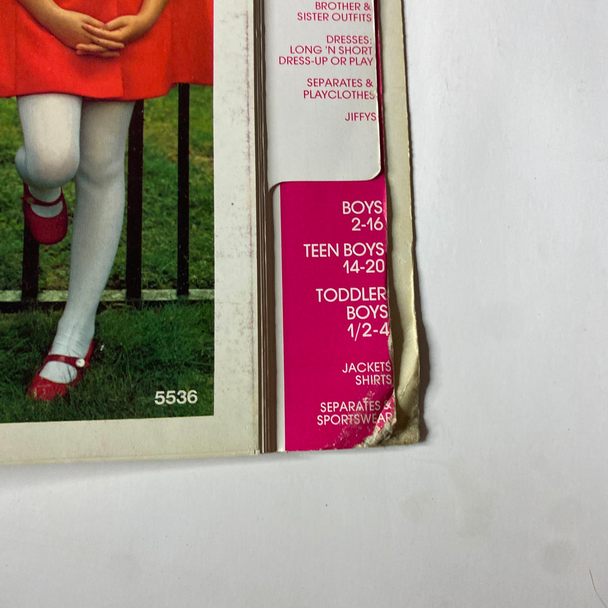 Detailed page from the 1973 Simplicity Spring and Summer Catalog showing various children's fashion styles and dress-up options.