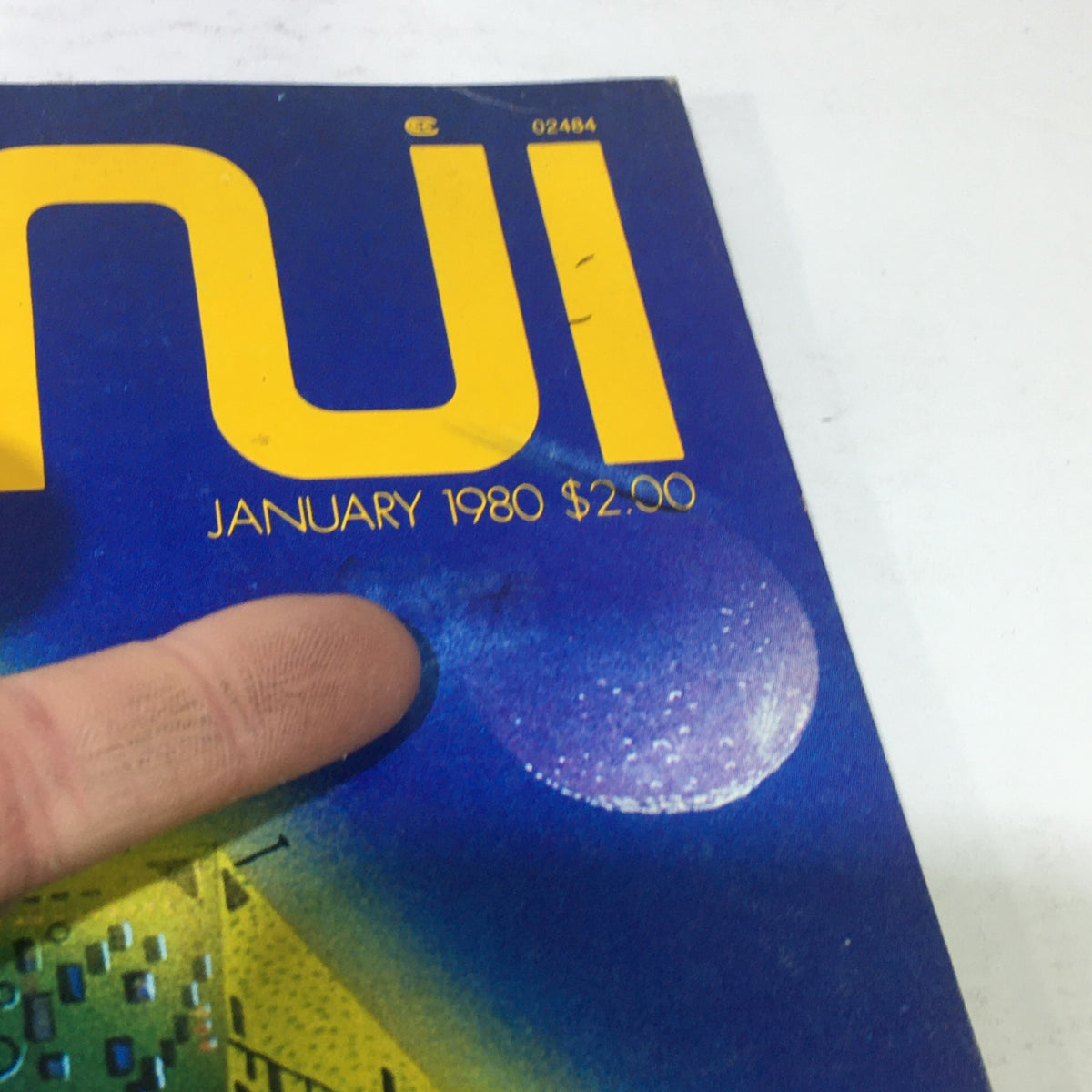 Detail shot of the Omni Magazine January 1980, emphasizing the top section with the publication date and price, showcasing its vintage character.