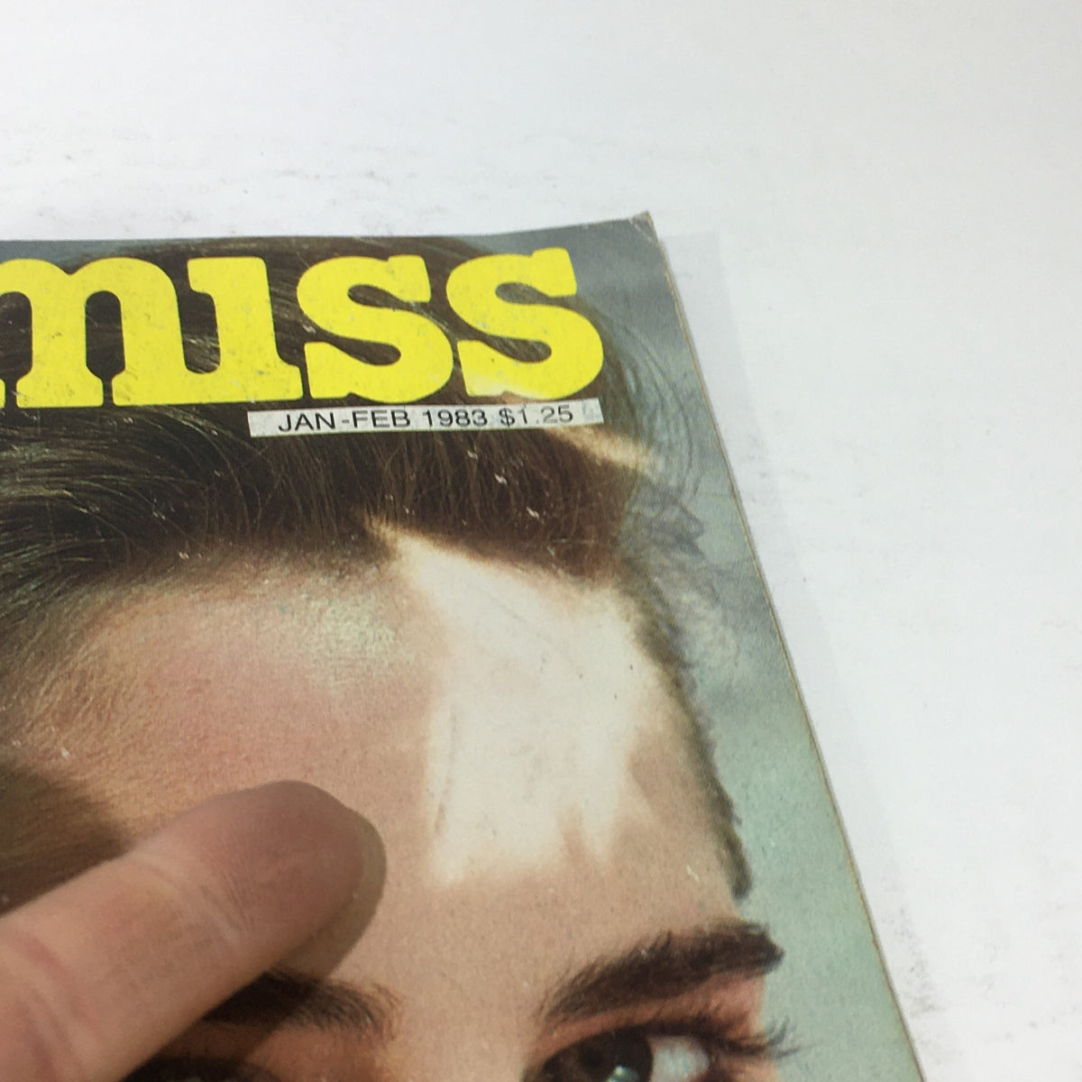 Close-up view of the VTG Young Miss Magazine: January-February 1983 cover, displaying the magazine title and publication date along with a price tag, emphasizing its collectible nature.
