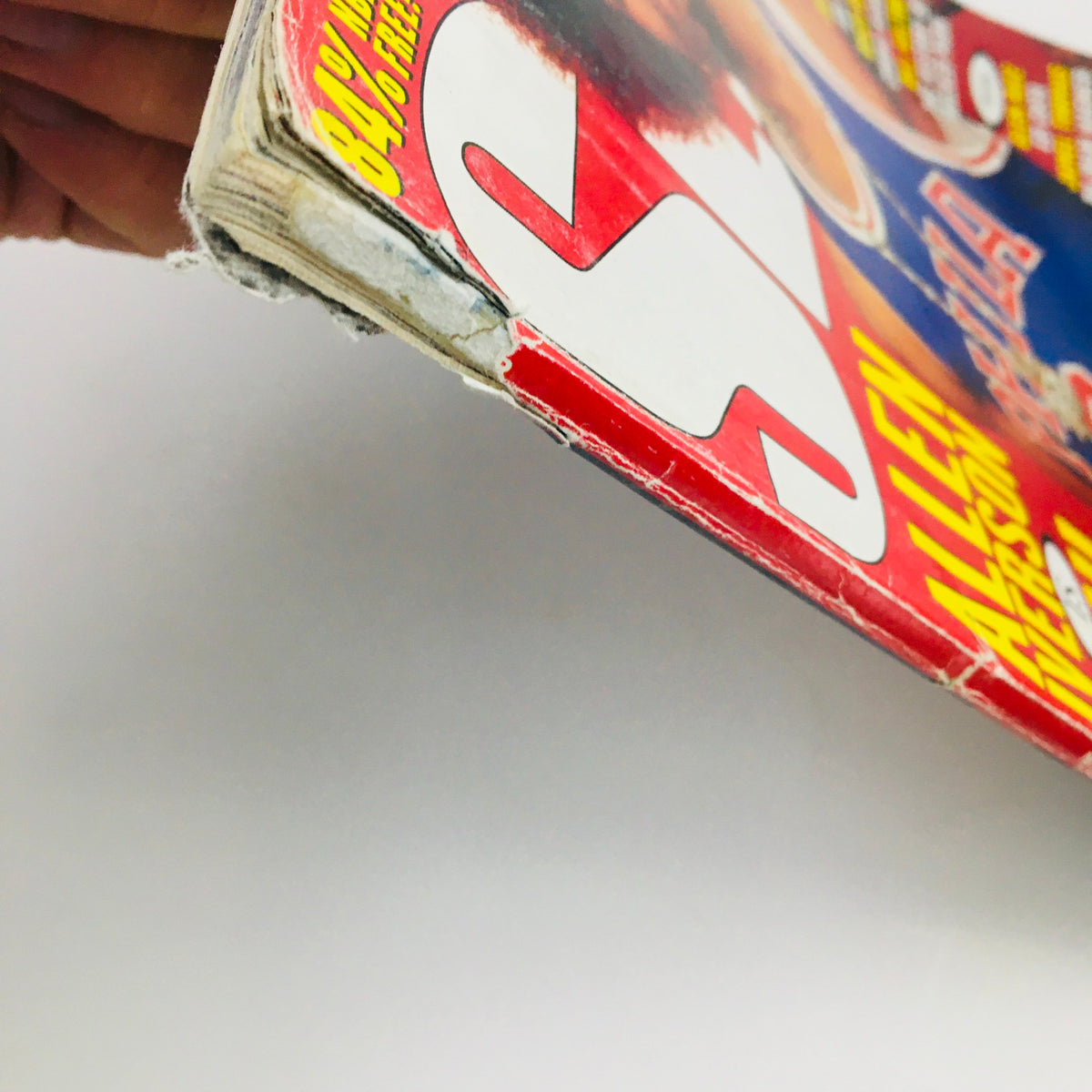 Edge view of Slam Magazine March 1999 featuring Allen Iverson, showing minor wear which highlights its vintage character.