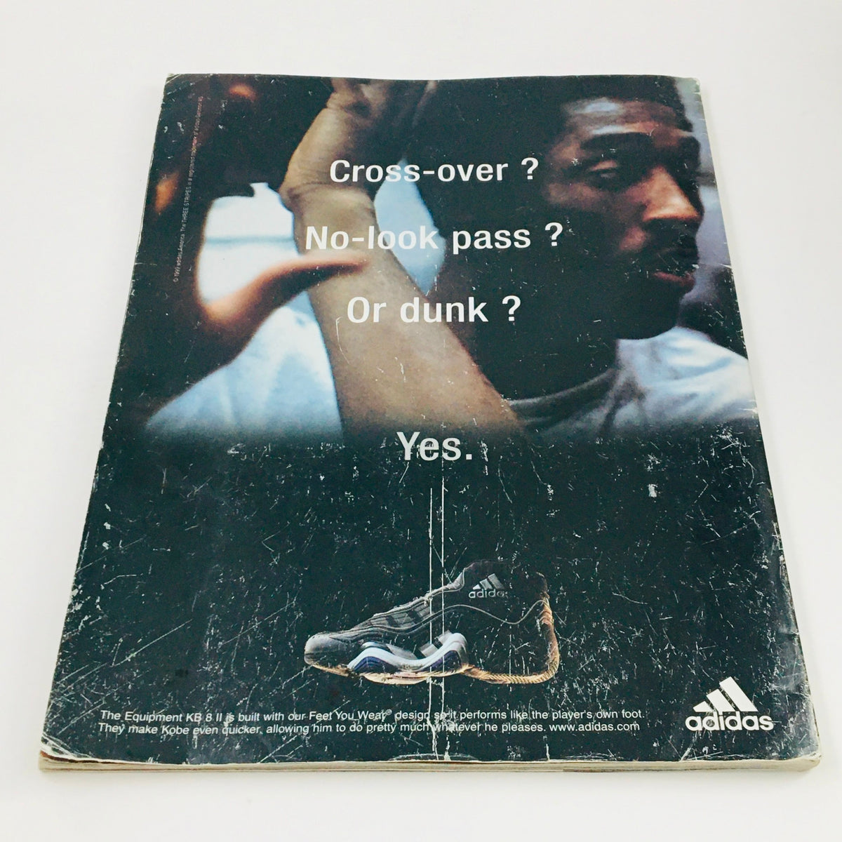 Back cover of Slam Magazine June 1999, featuring a minimalist adidas advertisement with questions about basketball moves. This vintage magazine captures key moments in basketball history.