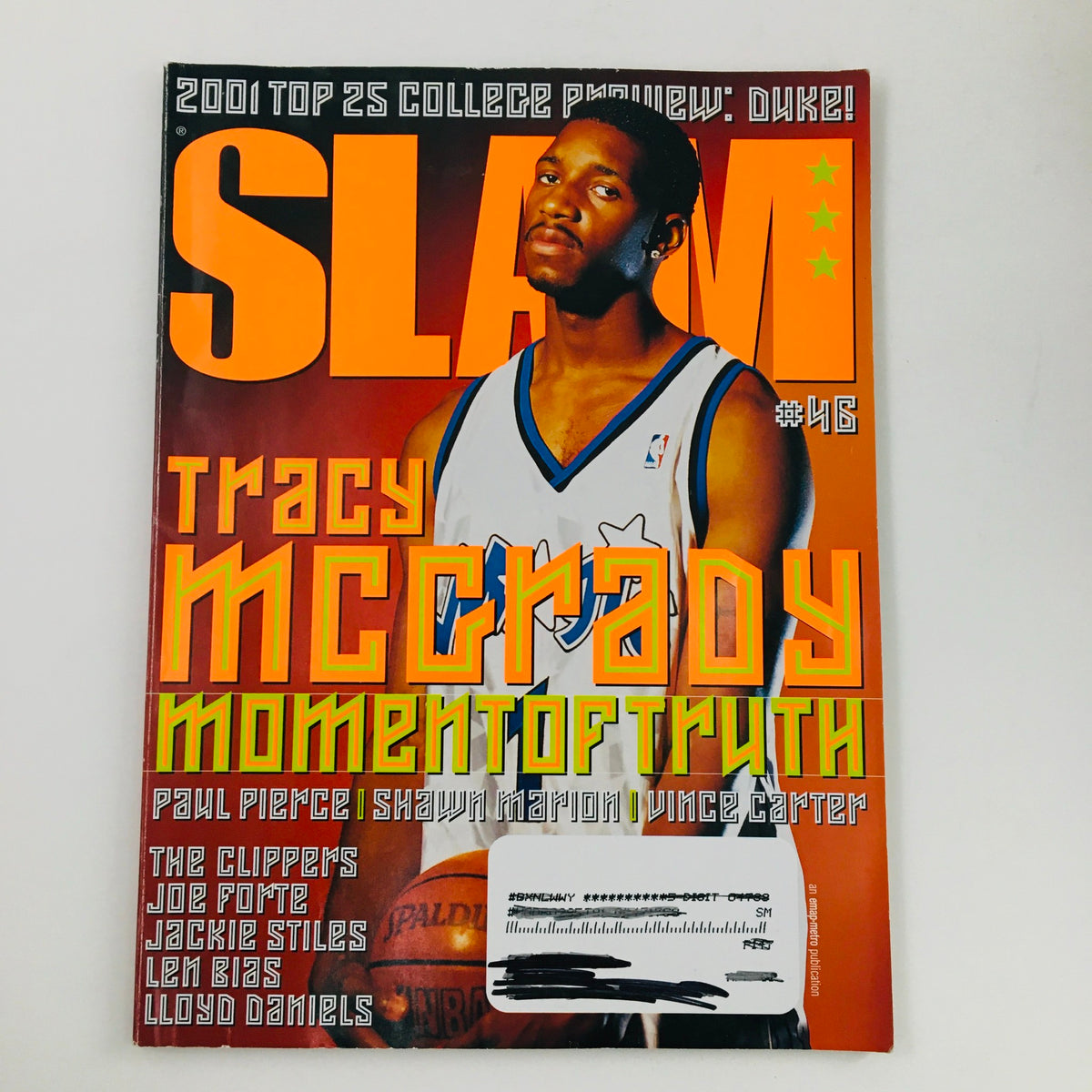 Slam Magazine 2001 #46 featuring Tracy McGrady with the Orlando Magic on the cover, showcasing Paul Pierce and other basketball stars, highlighting the era of early 2000s NBA.