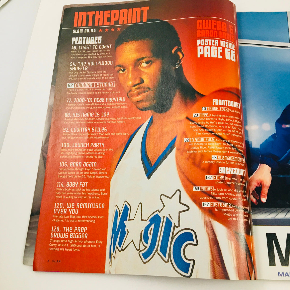 Inside page of Slam Magazine 2001 #46 featuring Tracy McGrady, displaying section titled 'In The Paint' and a notable 'Poster Inside' mention, capturing the essence of basketball culture in 2001.