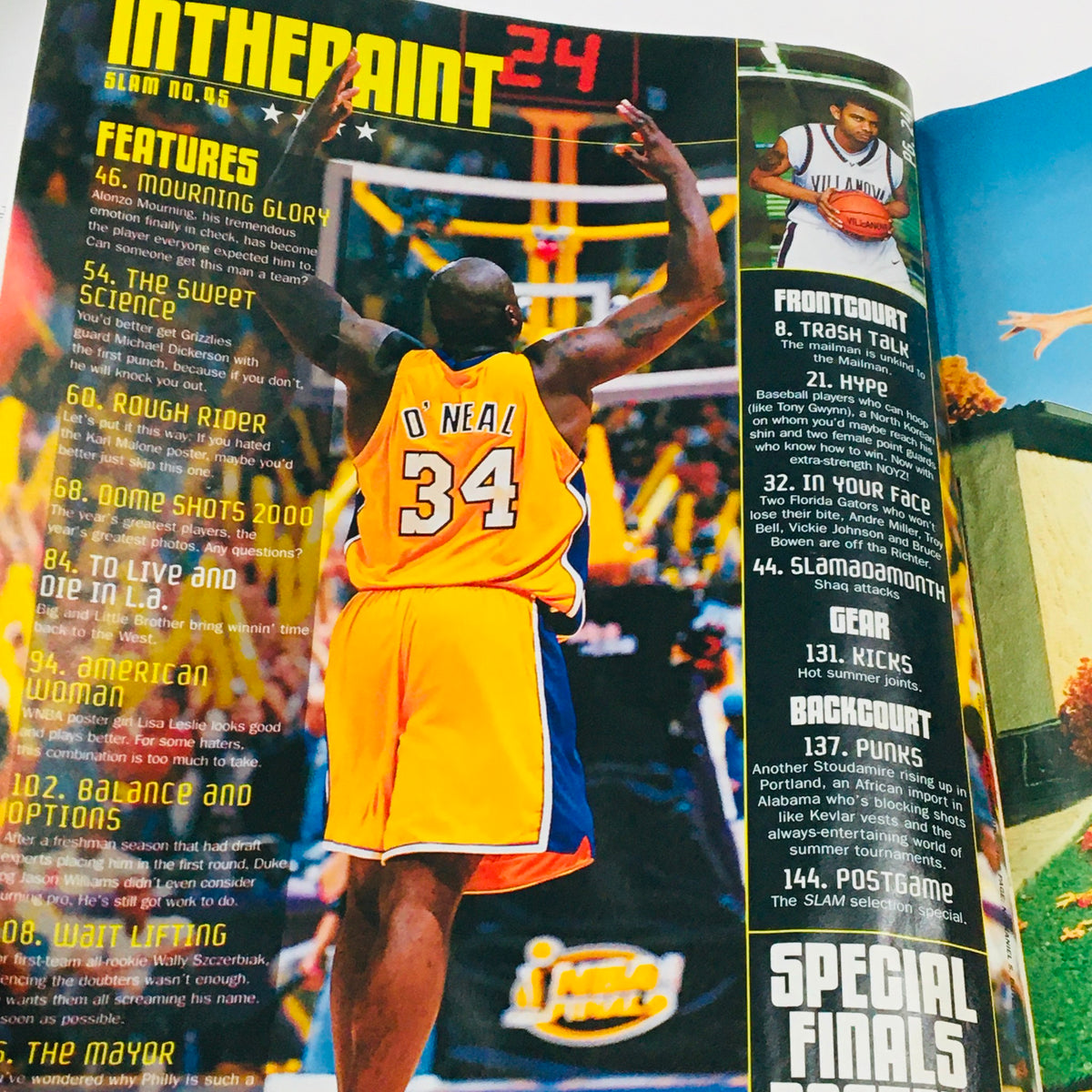 Inside page of Slam Magazine September 2000 highlighting Shaquille O'Neal on the court, noting features on multiple players and showcasing vibrant basketball imagery.