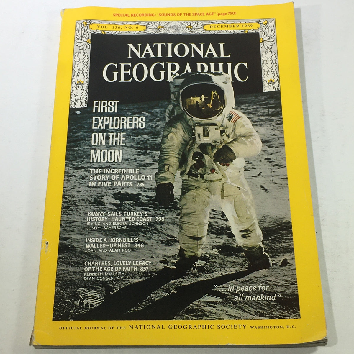 VTG National Geographic Magazine December 1969 featuring the story of Apollo 11 with an astronaut on the Moon.
