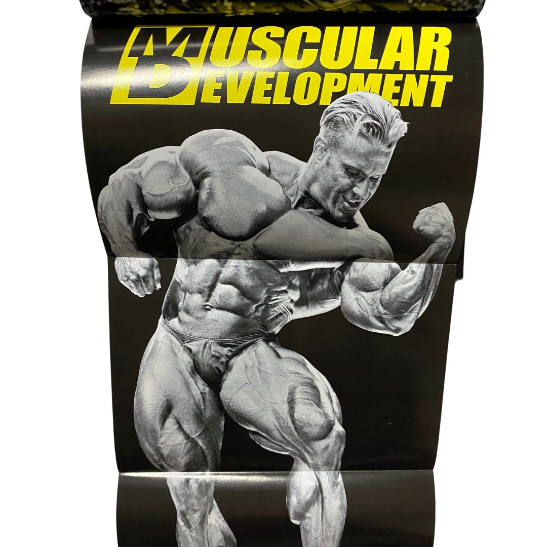 Exclusive poster from Muscular Development Magazine May 2012, featuring a powerful image of Ronnie Coleman, ideal for display.