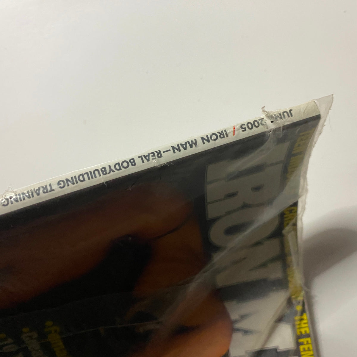 Close-up view of the Iron Man Magazine June 2005 showing the side edge with text indicating it is a June 2005 issue, emphasizing its collectible status.