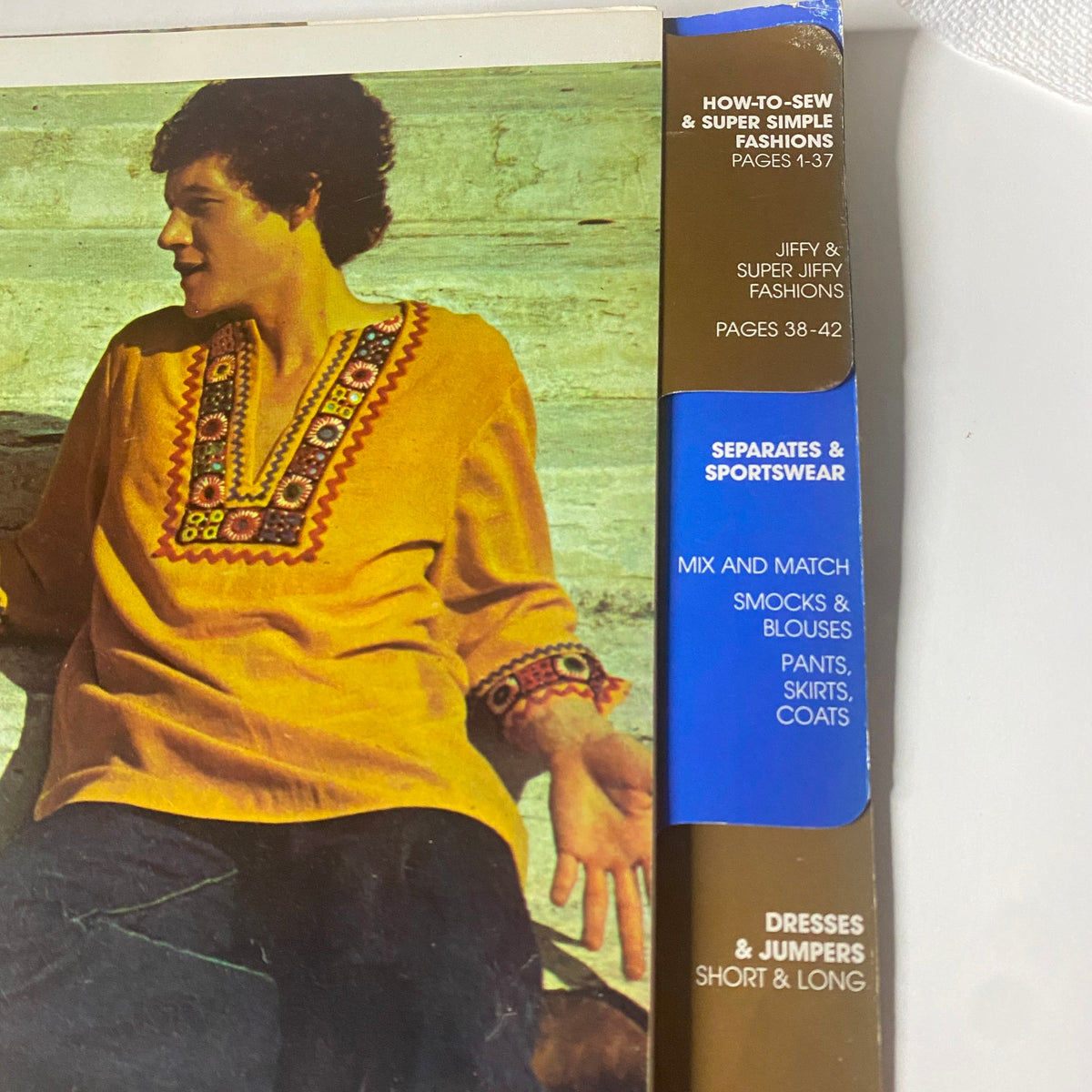 Inside pages of the 1973 Simplicity Fall and Winter School Catalog highlighting how-to-sew and super simple fashion designs.