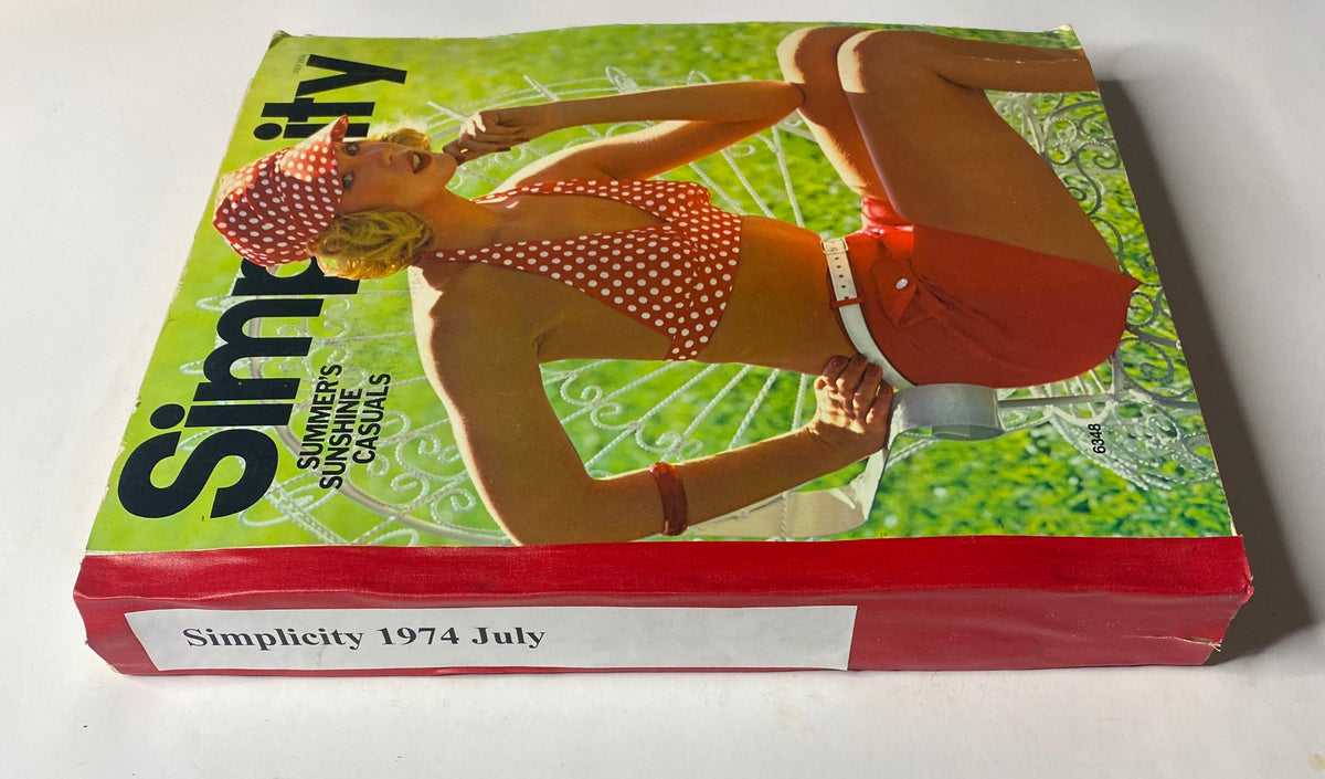 1974 July Simplicity Summer Catalog showcasing a model in a polka dot bikini and red shorts, embodying mid-1970s fashion.