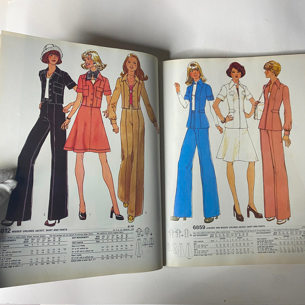 Stylish models displaying coordinated outfits including jackets and pants from the 1975 Simplicity Special Catalog, epitomizing 1970s fashion.