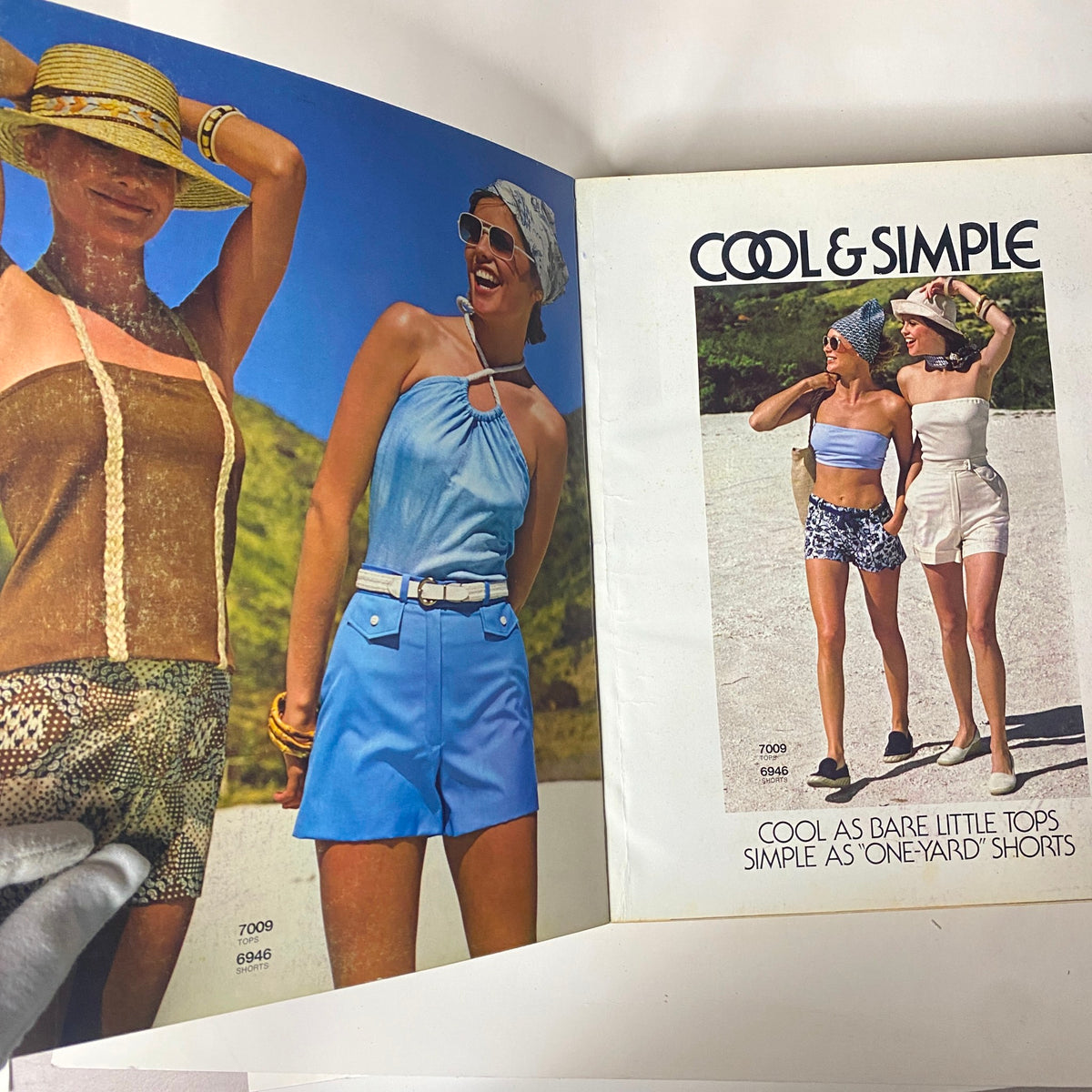 1975 August Simplicity Catalog featuring stylish summer sewing patterns for Misses and Junior Petites, featuring models showcasing cool and simple summer tops and shorts.