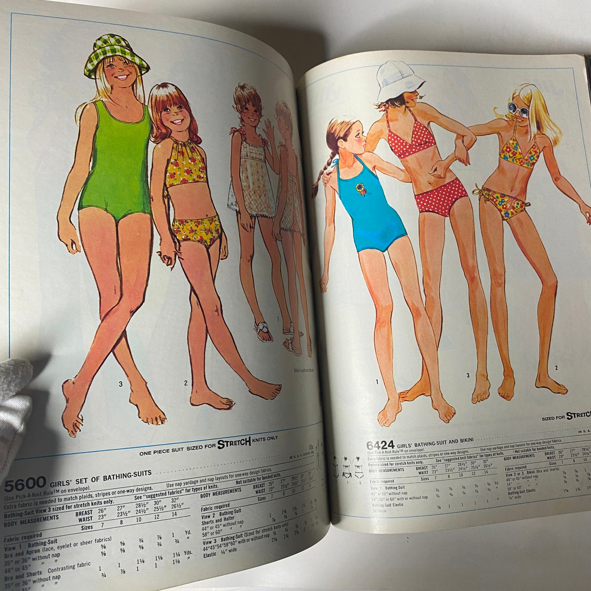 1975 August Simplicity Catalog featuring stylish illustrations of girls in bathing suits, showcasing patterns for retro swimwear designs. Perfect for collectors and DIY fashion enthusiasts.