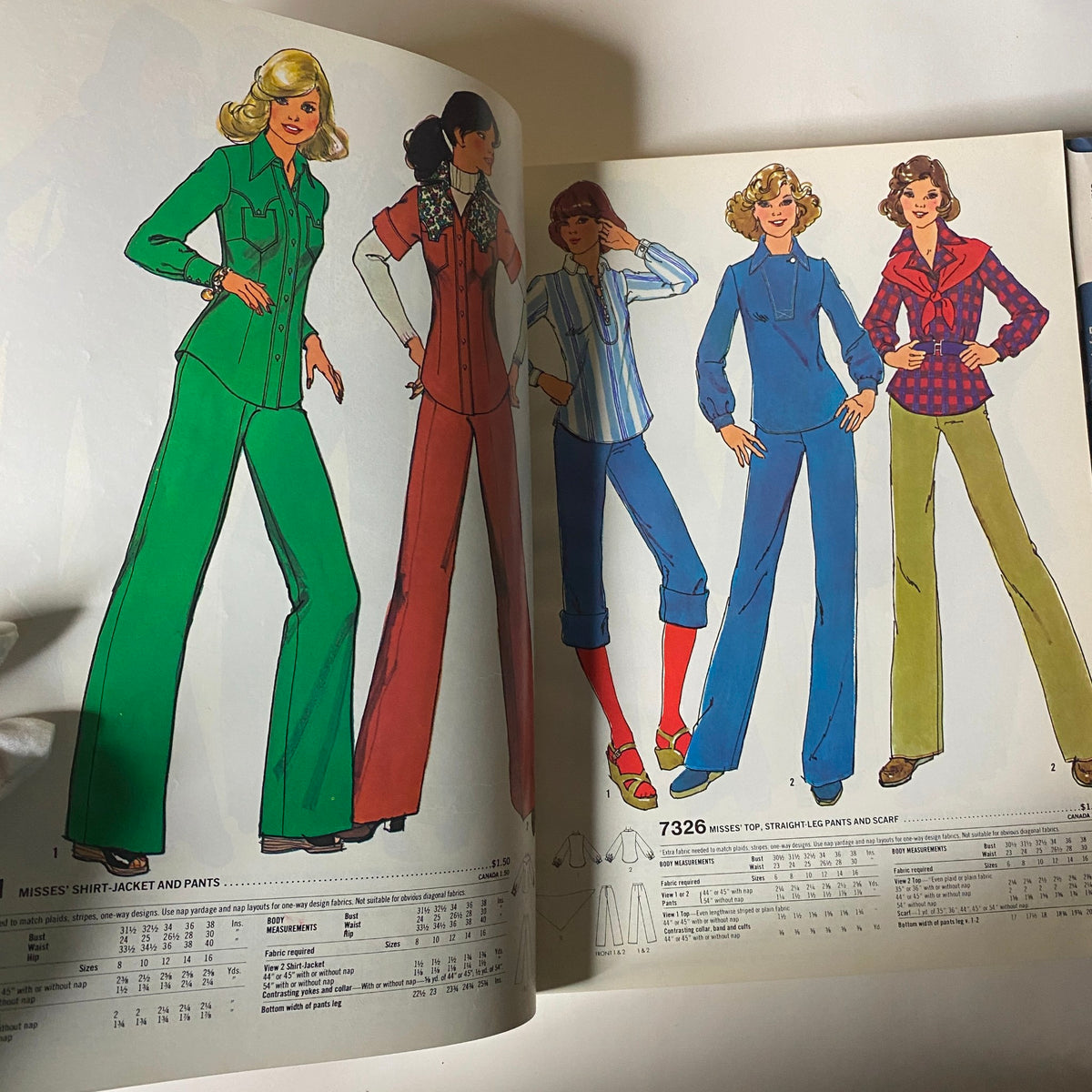 1976 March Simplicity Catalog page featuring sewing pattern illustrations for Misses’ shirt-jacket and pants, emphasizing 70s style and fashion trends.