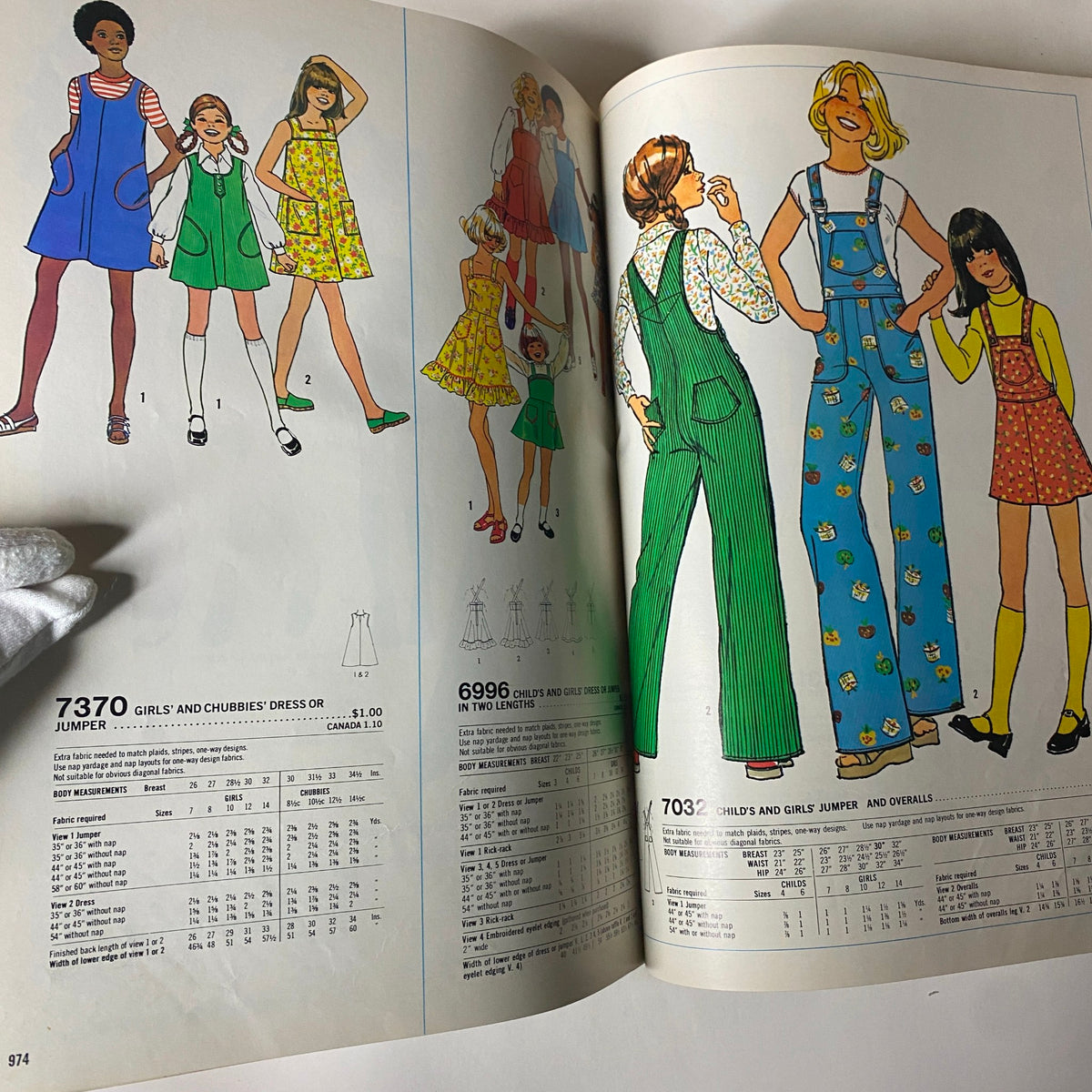 1976 October Simplicity Sewing Pattern Catalog highlighting girls' dresses and jumpers with colorful illustrations and sizing information for children.