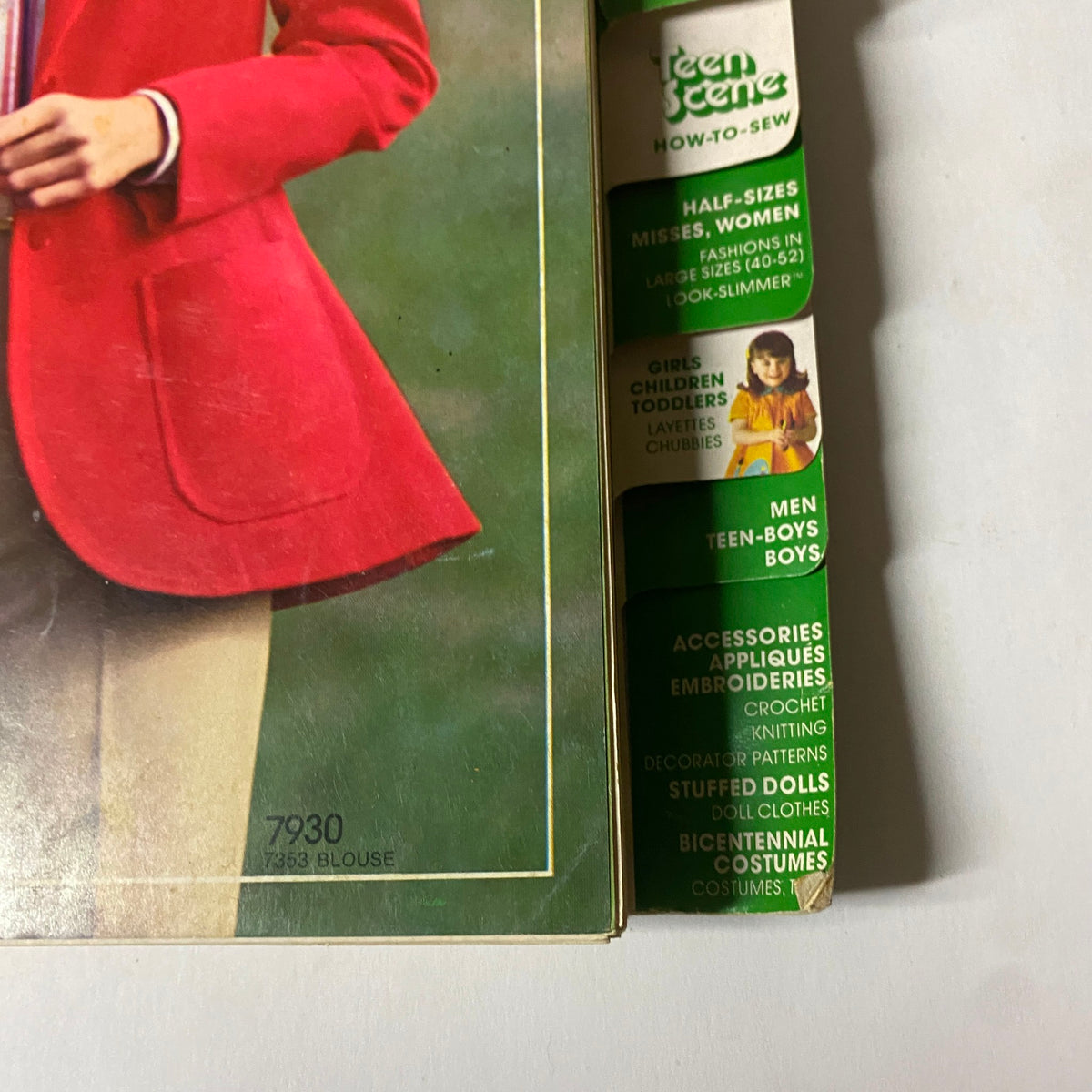 Detail view of the 1977 April Simplicity Sewing Pattern Catalog highlighting the Teen Scene and How-To-Sew sections alongside various fashion categories.
