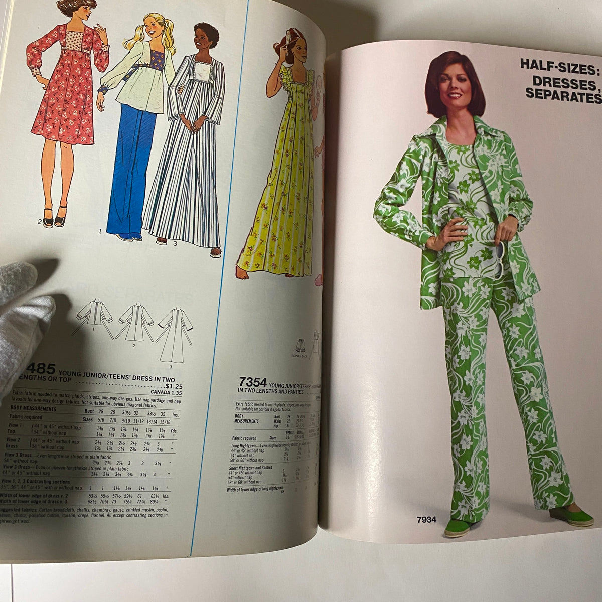 1977 April Simplicity Sewing Pattern Catalog presenting half-sizes designs for dresses and separates, illustrating the popular styles of the late 1970s.
