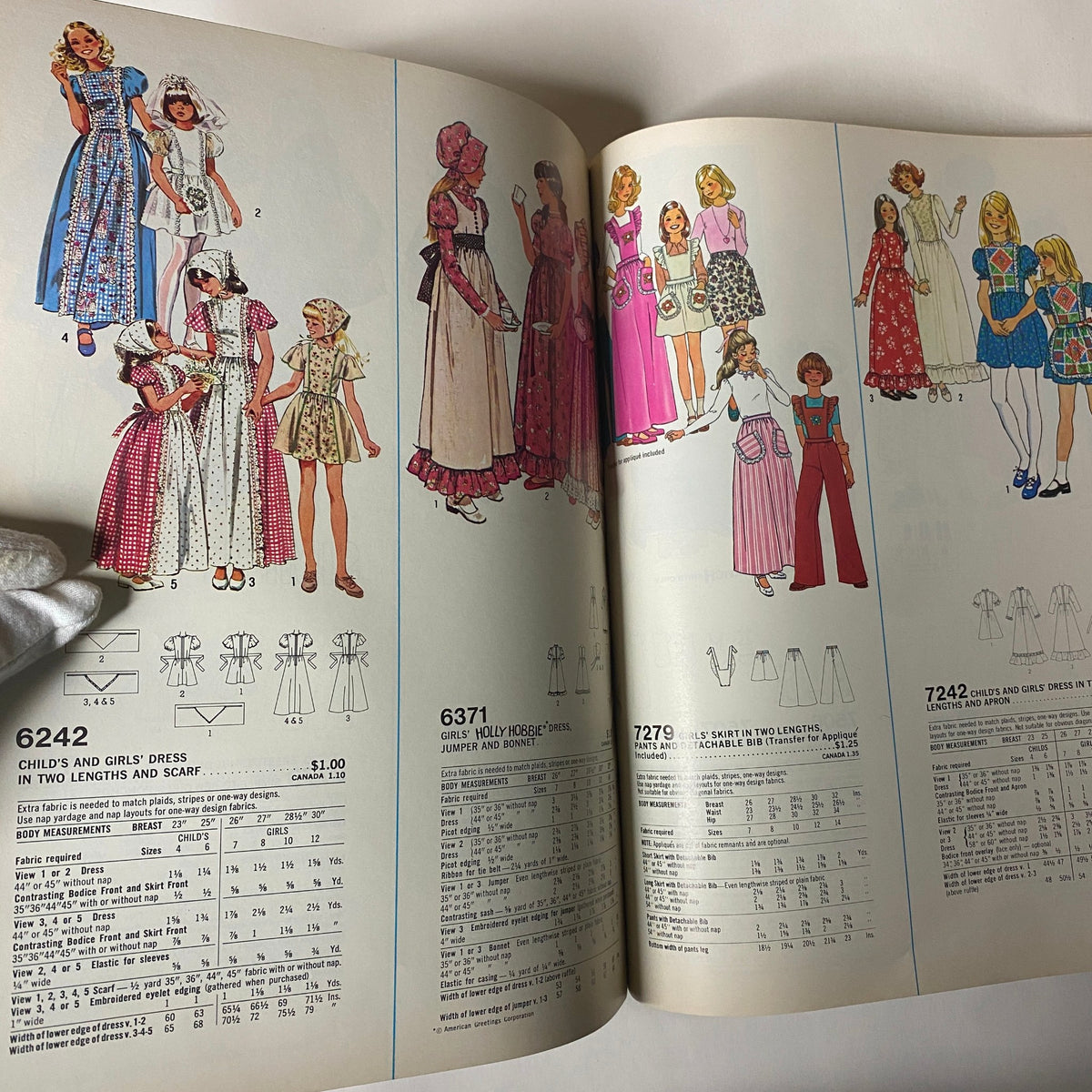 Illustration from the 1977 March Simplicity Sewing Pattern Catalog displaying various children's dress patterns, including options for girls, with intricate details highlighting 1970s fashion trends.