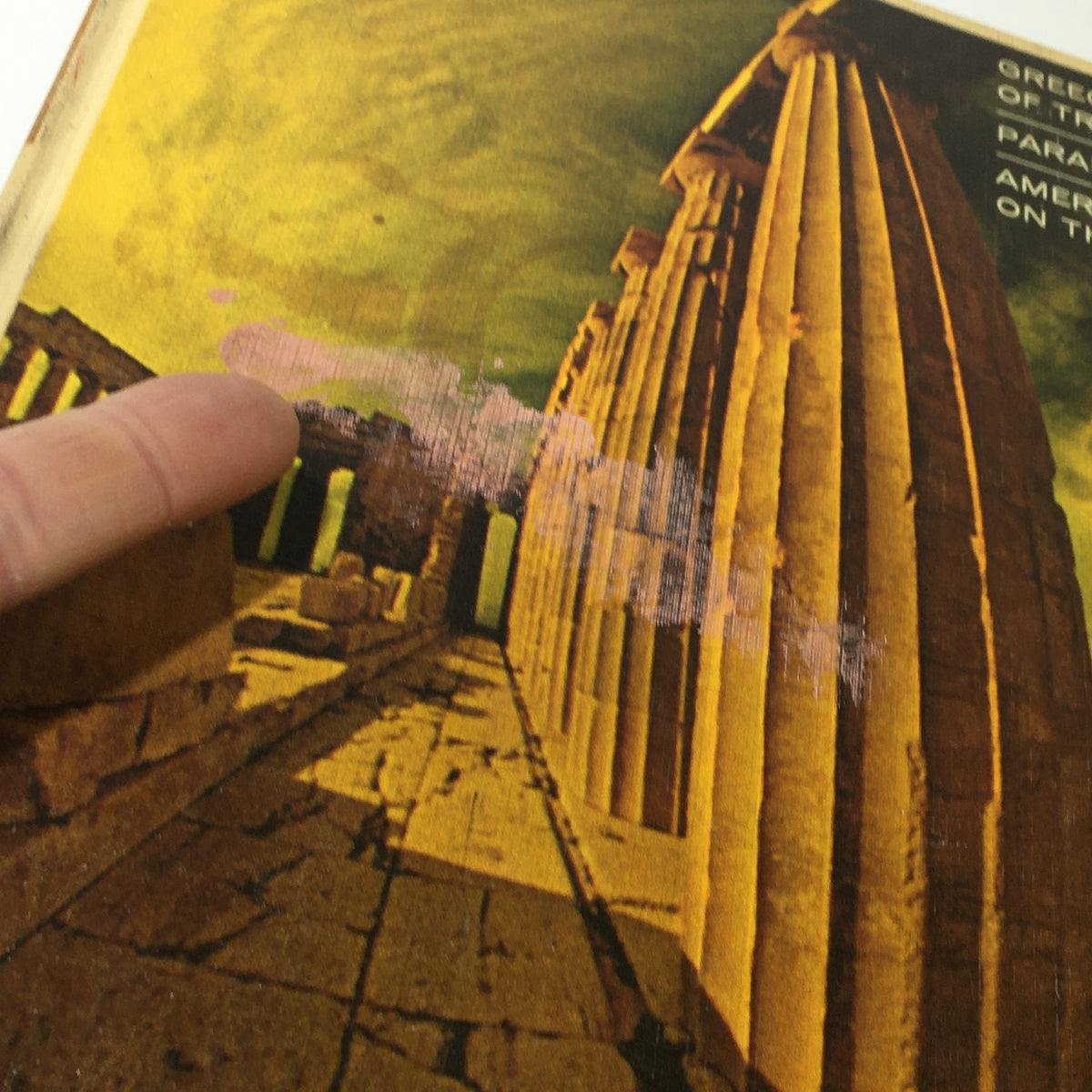 Close-up of the cover of VTG Venture Magazine Book: June 1964, highlighting details of ancient architecture and text themes about Greece, Paradise Lost, and America.