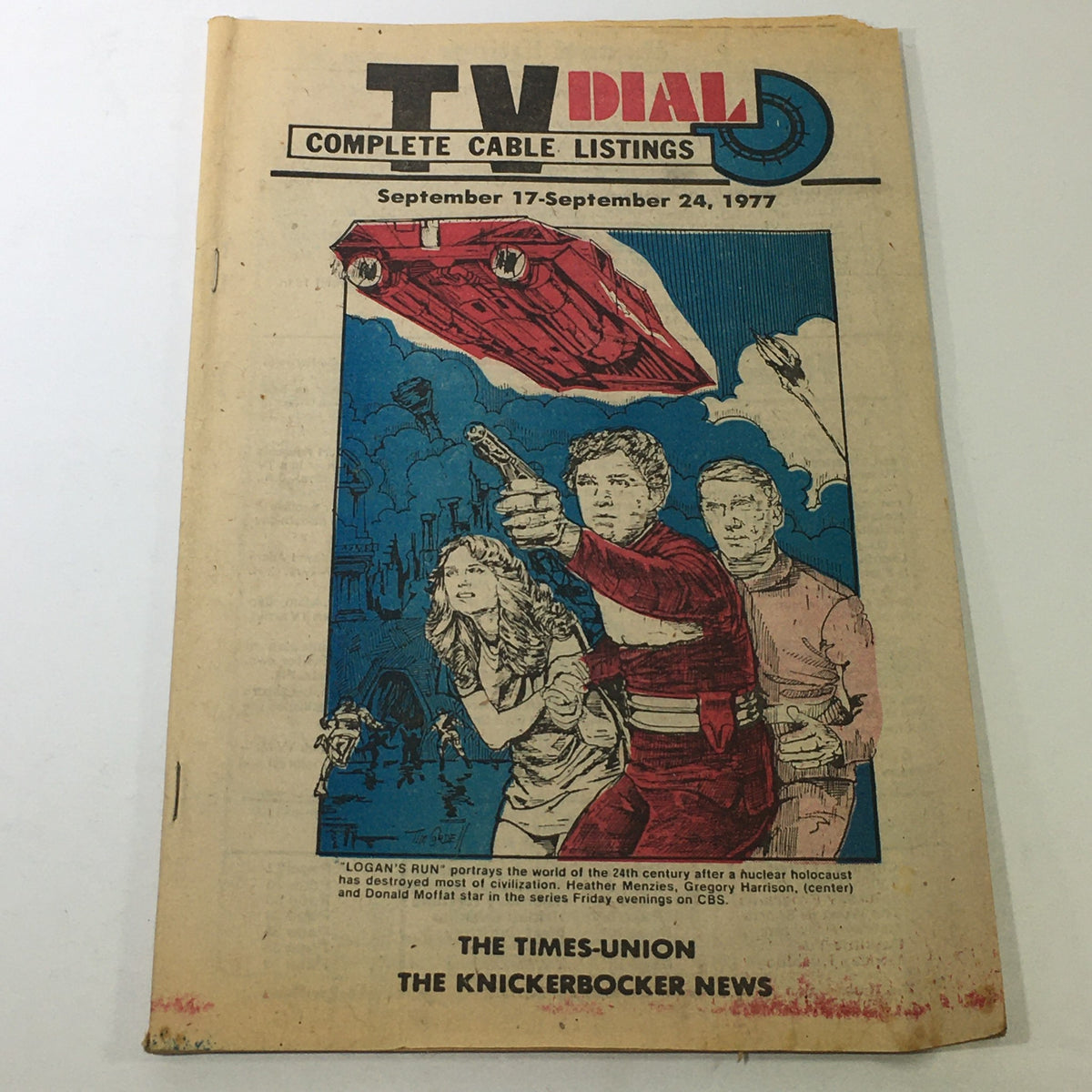 Cover of VTG TV Dial Complete Cable Listings from September 17-24, 1977 featuring 'Logan's Run'. The vintage magazine displays a colorful illustration of characters from the sci-fi series, showcasing late 1970s television culture.