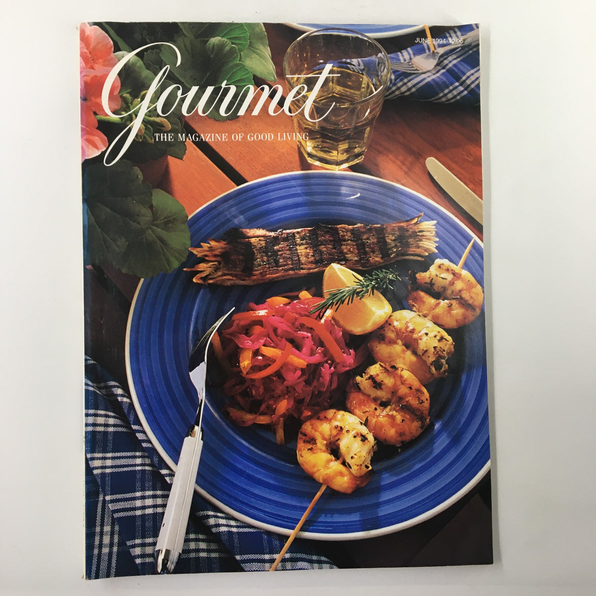 Cover of Gourmet Magazine June 1994 featuring a vibrant plate of grilled shrimp, vegetables, and a refreshing drink. This issue highlights the winners of the Local Color Travel Photo Contest, showcasing culinary travels.