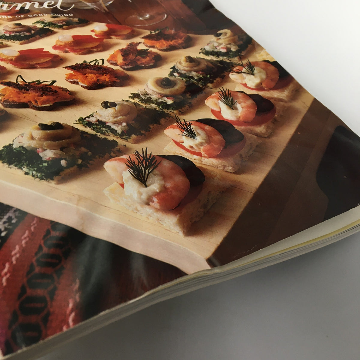 Close-up of Gourmet Magazine June 1991 cover, highlighting delicately arranged appetizers, reflecting the gourmet dining theme of the magazine.