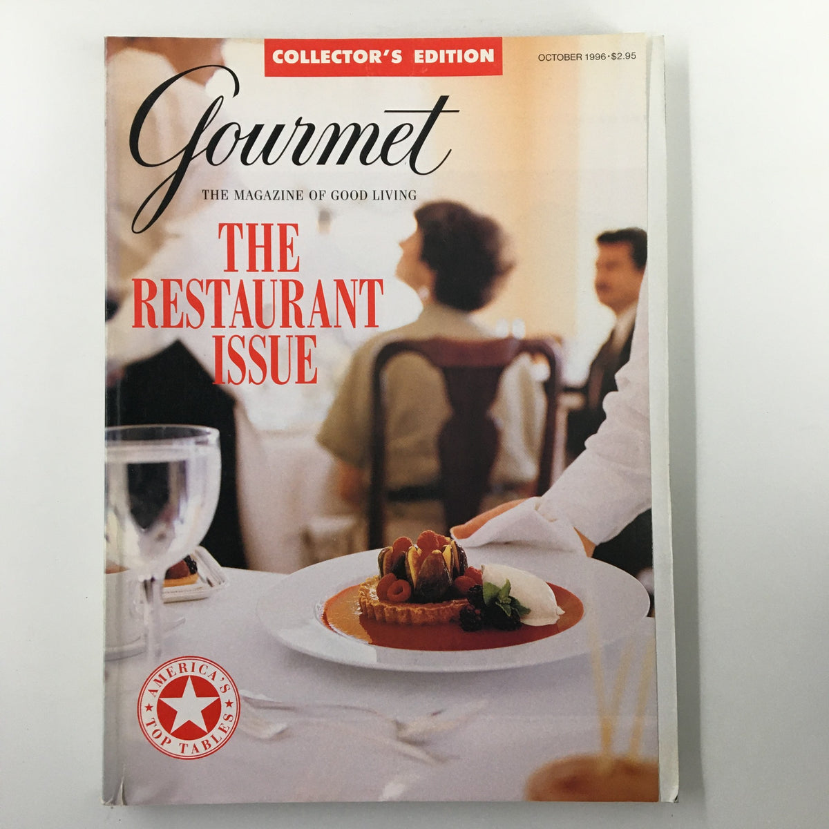 Cover of Gourmet Magazine October 1996, titled 'The Man Who Went To Dinner', showcasing an elegant dining table setting with a gourmet dessert, reflecting fine dining culture.