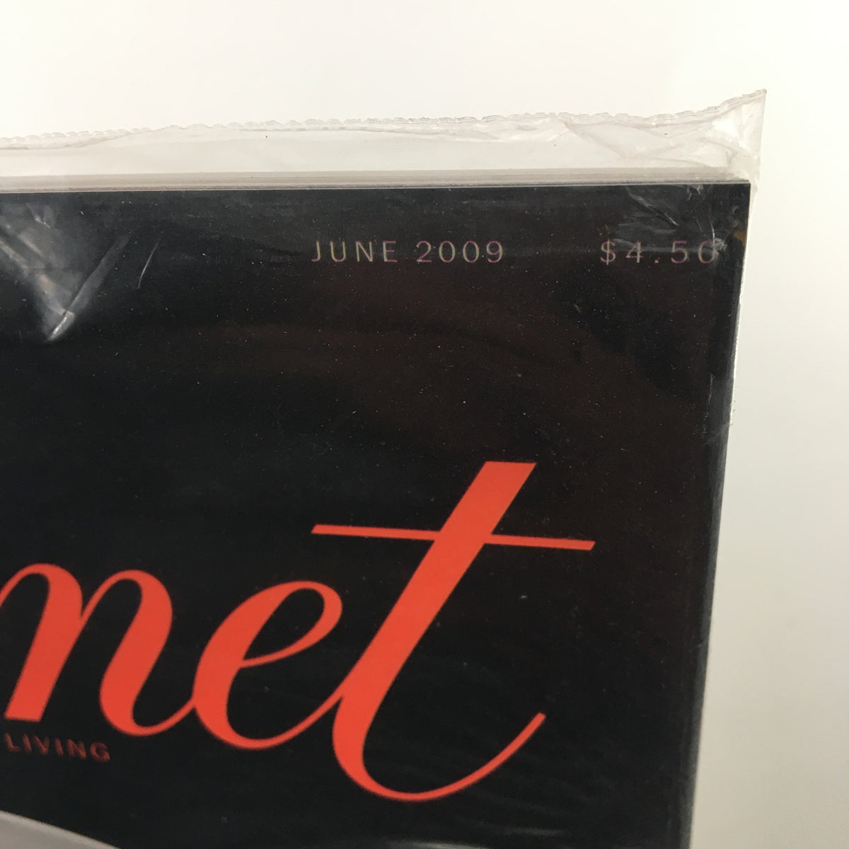 Close-up of the June 2009 issue of Gourmet Magazine, highlighting the magazine's title and publication date, emphasizing its collectible nature.