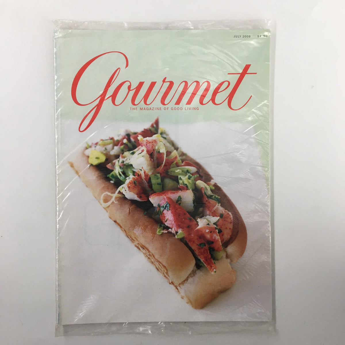 Gourmet Magazine July 2009 featuring Lobster Rolls with Lemon Vinaigrette, presented in a sealed condition, showcasing a vibrant cover design.