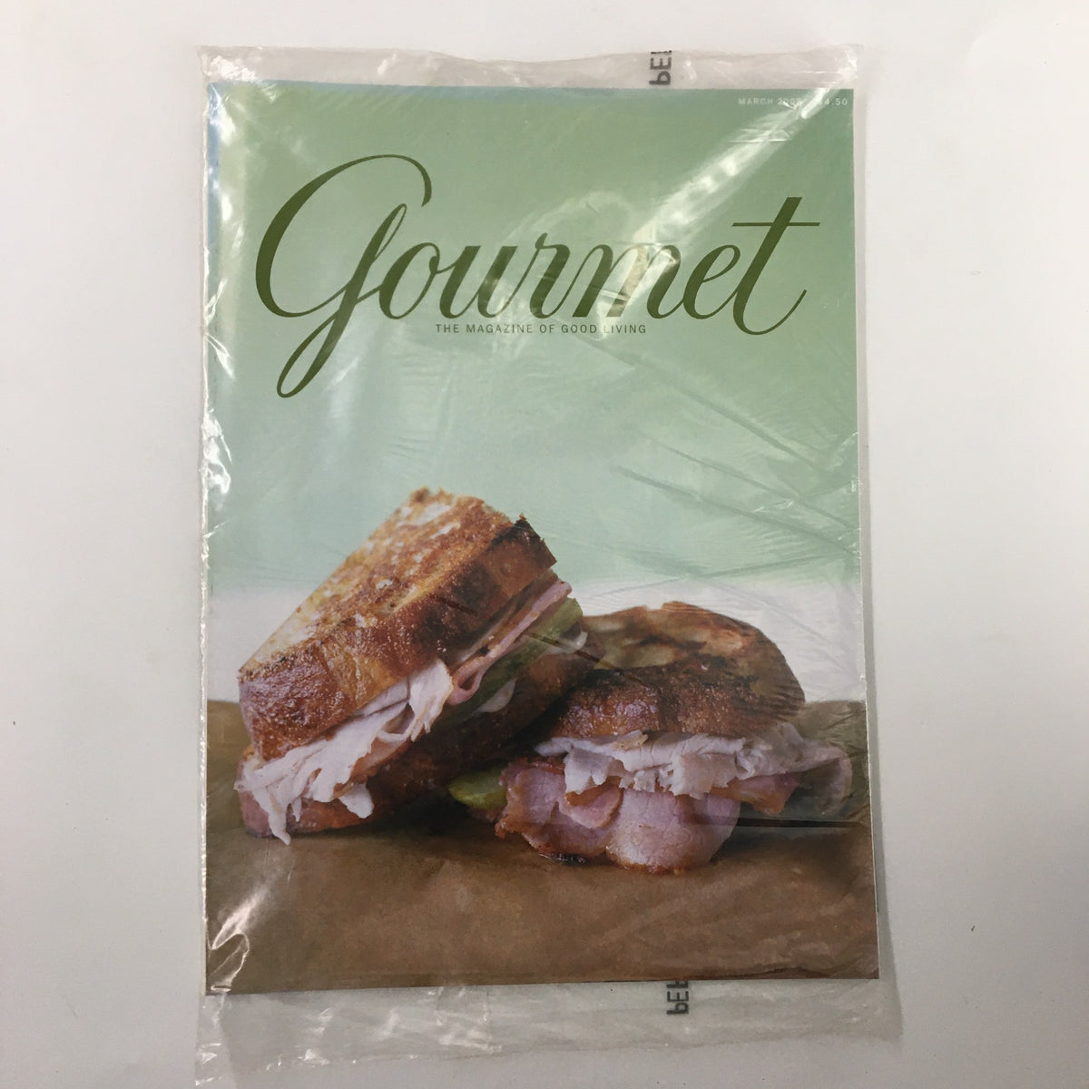 Gourmet Magazine March 2009, featuring a delicious sandwich on the cover, showcasing culinary excellence and the theme The Best Way To Visit Spain.