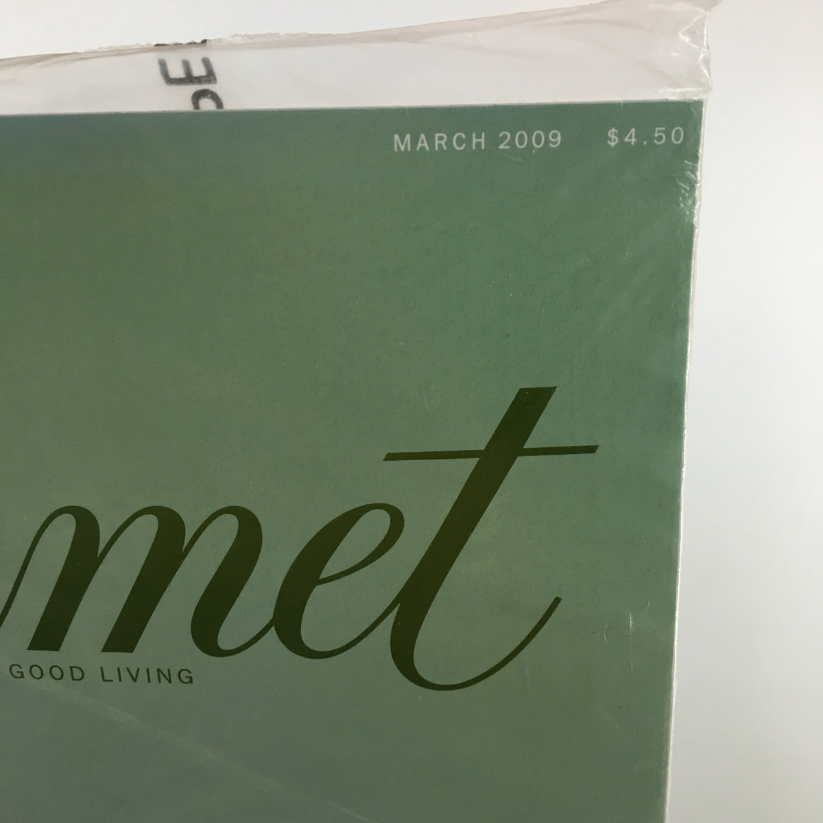 Close-up of the March 2009 issue of Gourmet Magazine, highlighting its title and date, reflecting the magazine's focus on food and good living.