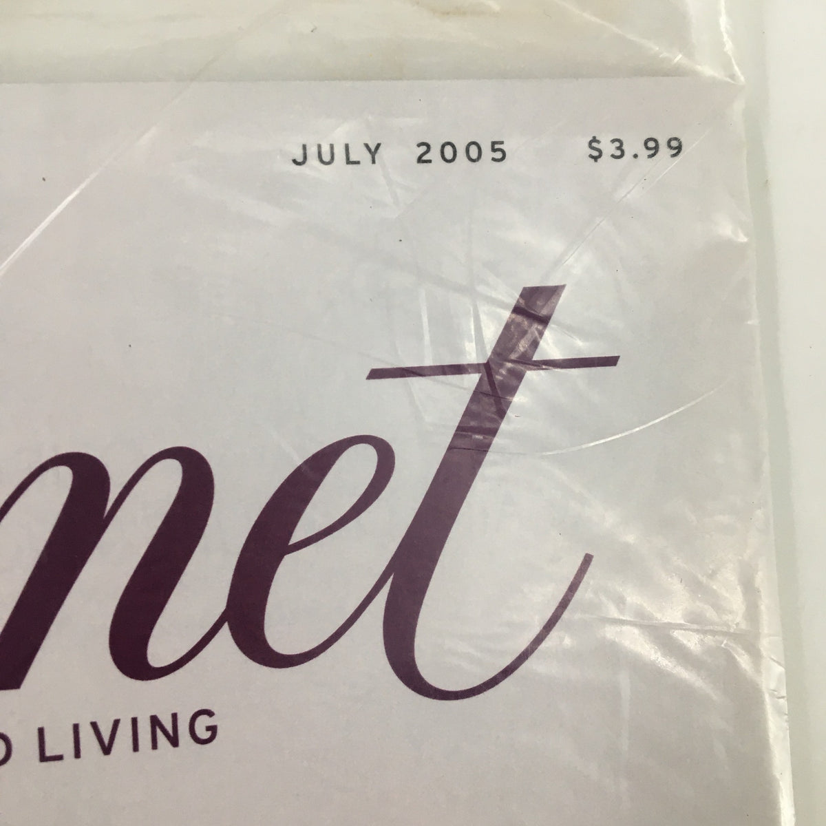 Detail of the cover of Gourmet Magazine July 2005, showcasing the date and price along with the title for the Blueberry Cake feature.