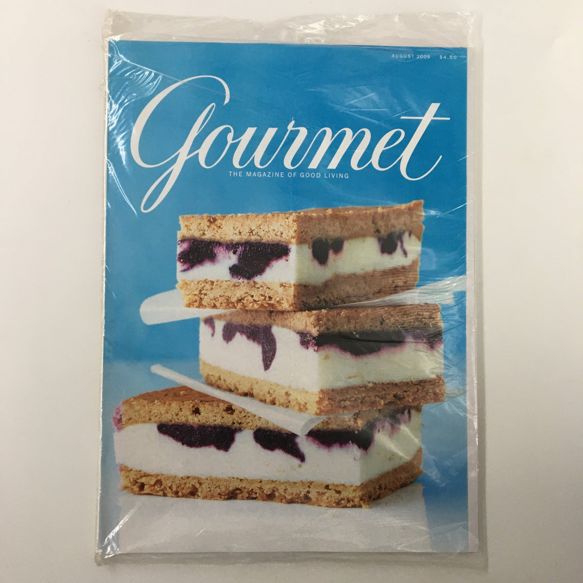 Gourmet Magazine August 2009 issue featuring a beautiful dessert on the cover, showcasing Italy's cheese culture. This vintage, sealed magazine is perfect for collectors and culinary enthusiasts.