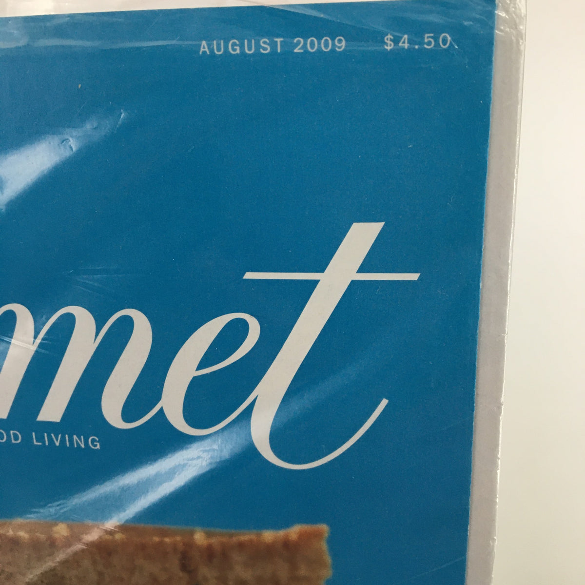 Cover of Gourmet Magazine August 2009 featuring the title and date, showcasing Italy's Cheese Lovers Paradise.