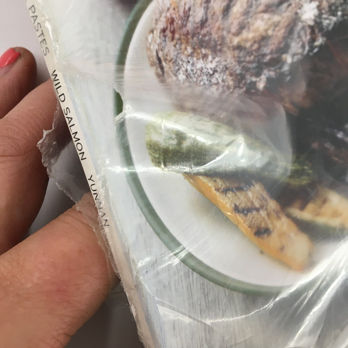 Close-up shot of the edge of the Gourmet Magazine June 2007 showing wild salmon and grilled vegetables, emphasizing its grilling techniques.