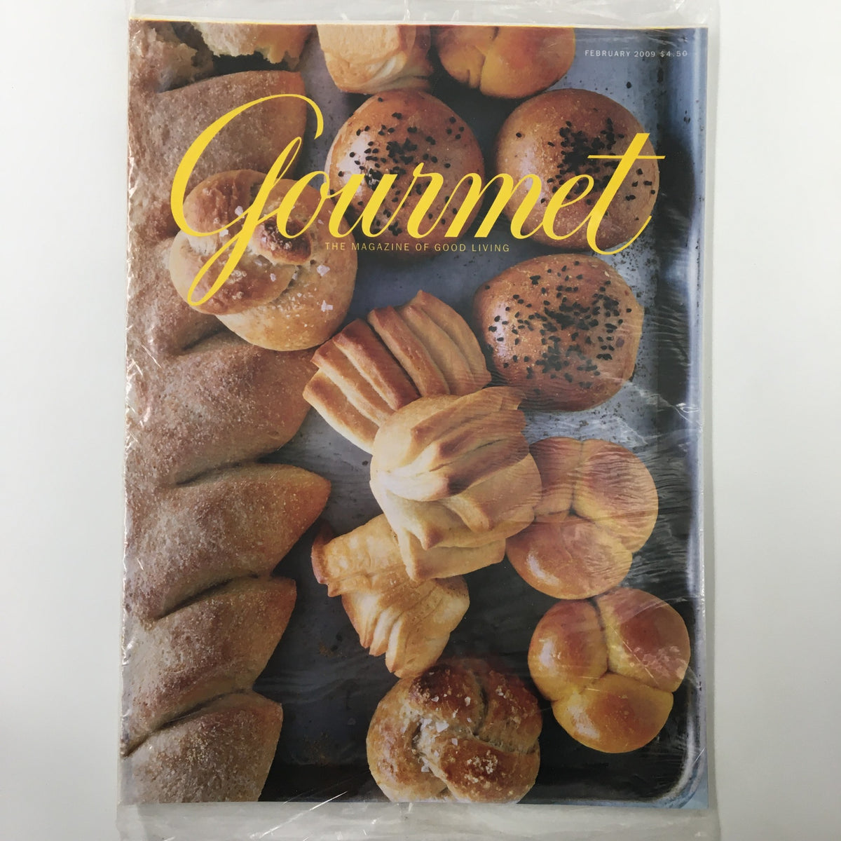 Cover of Gourmet Magazine February 2009 featuring The Famous Buttermilk Fantails Recipe, showcasing an array of freshly baked breads and pastries, in a sealed condition.