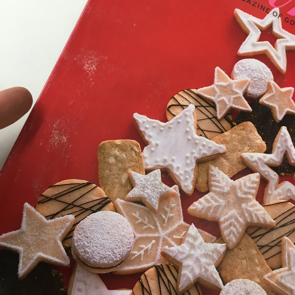 Gourmet Magazine December 2003 cover featuring an assortment of decorated cookies, including star shapes and festive designs, ideal for dessert lovers and collectors.