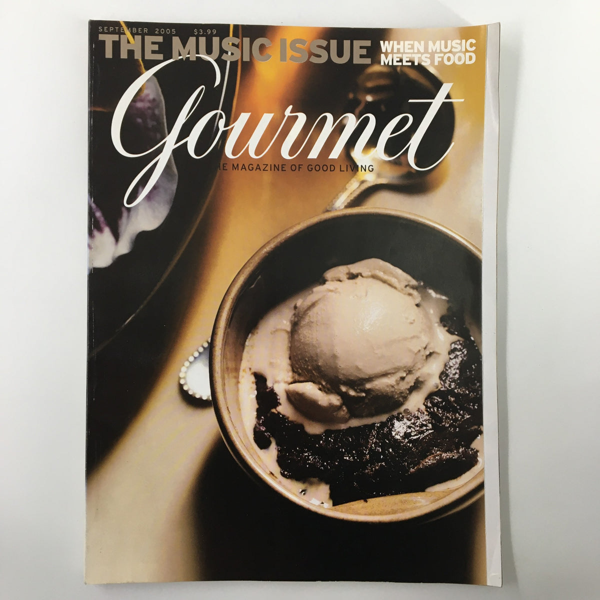 Cover of Gourmet Magazine September 2005 titled 'The Music Issue' featuring a bowl of ice cream dessert, celebrating the theme of music and culinary delights. This issue includes a tribute to Elvis Presley, who has been gone for 27 years, highlighting the intersection of gourmet dining and pop culture.