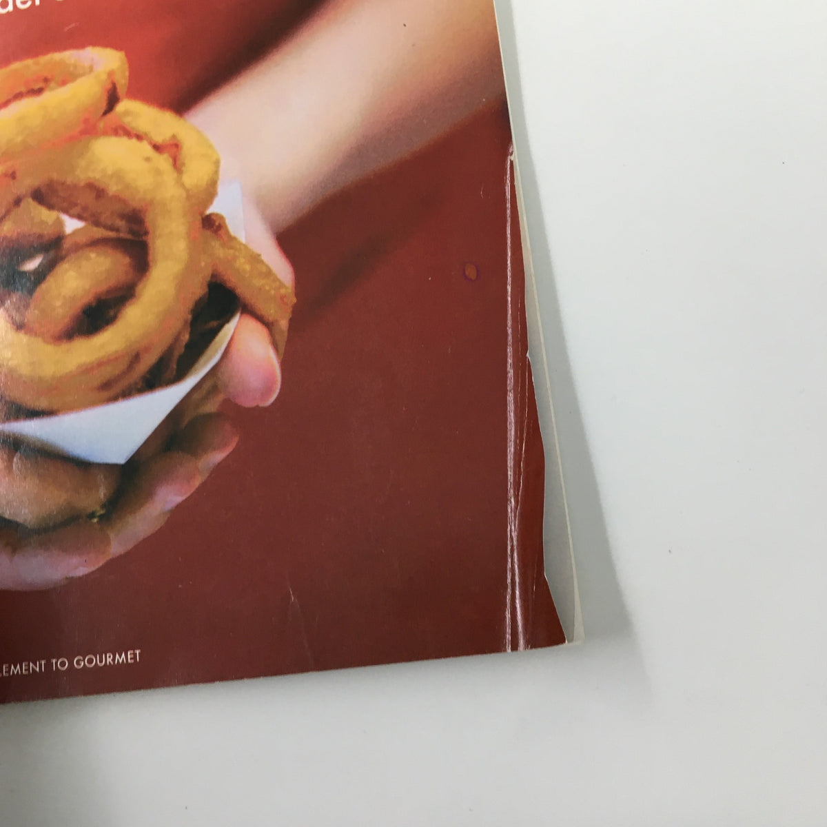Cover image of Gourmet Magazine November 2003 featuring an artistic presentation of hand-held fried food snacks, highlighting the theme of America's best road food.