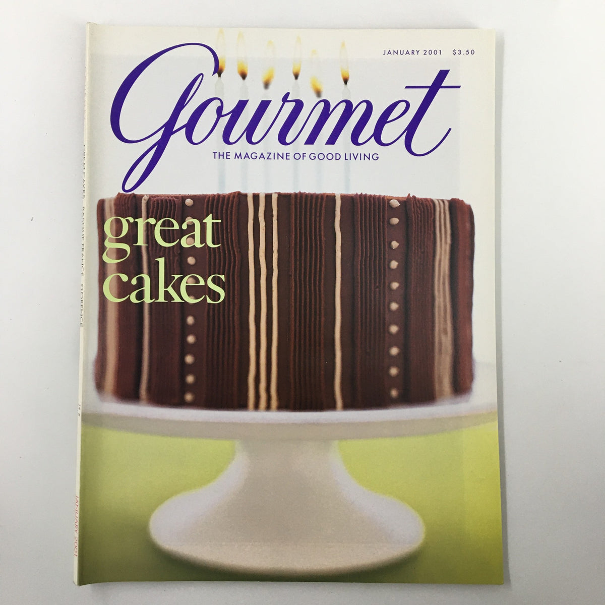 Cover of Gourmet Magazine January 2001 featuring a beautifully decorated chocolate cake, emphasizing the theme of 'great cakes', highlighting culinary artistry.
